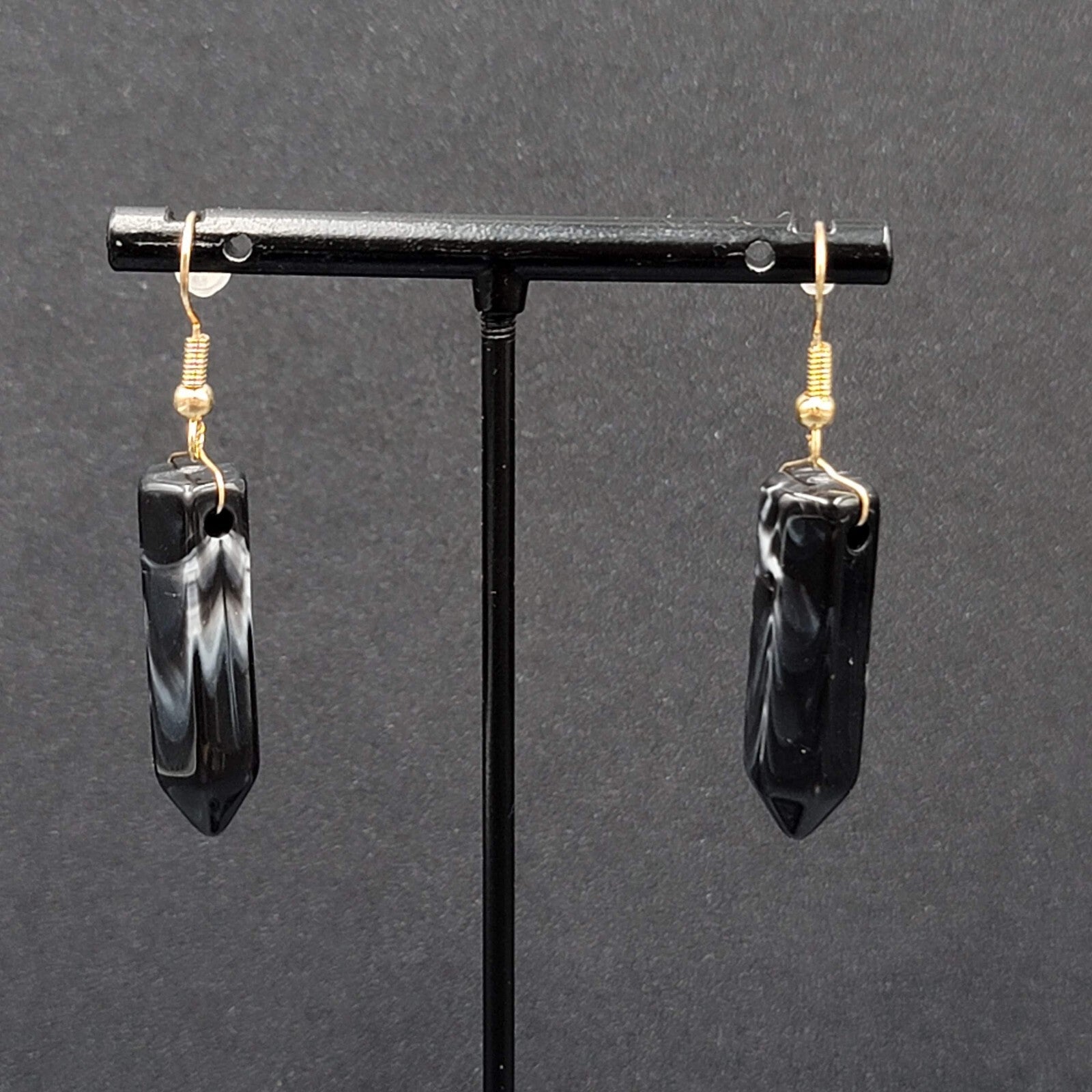 Pierced Earrings Black Marbled Resin Spike Pendulum Dangle Gold tone Hook 1.25"
