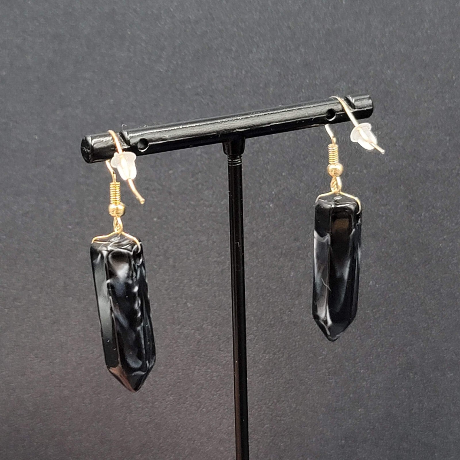 Pierced Earrings Black Marbled Resin Spike Pendulum Dangle Gold tone Hook 1.25"