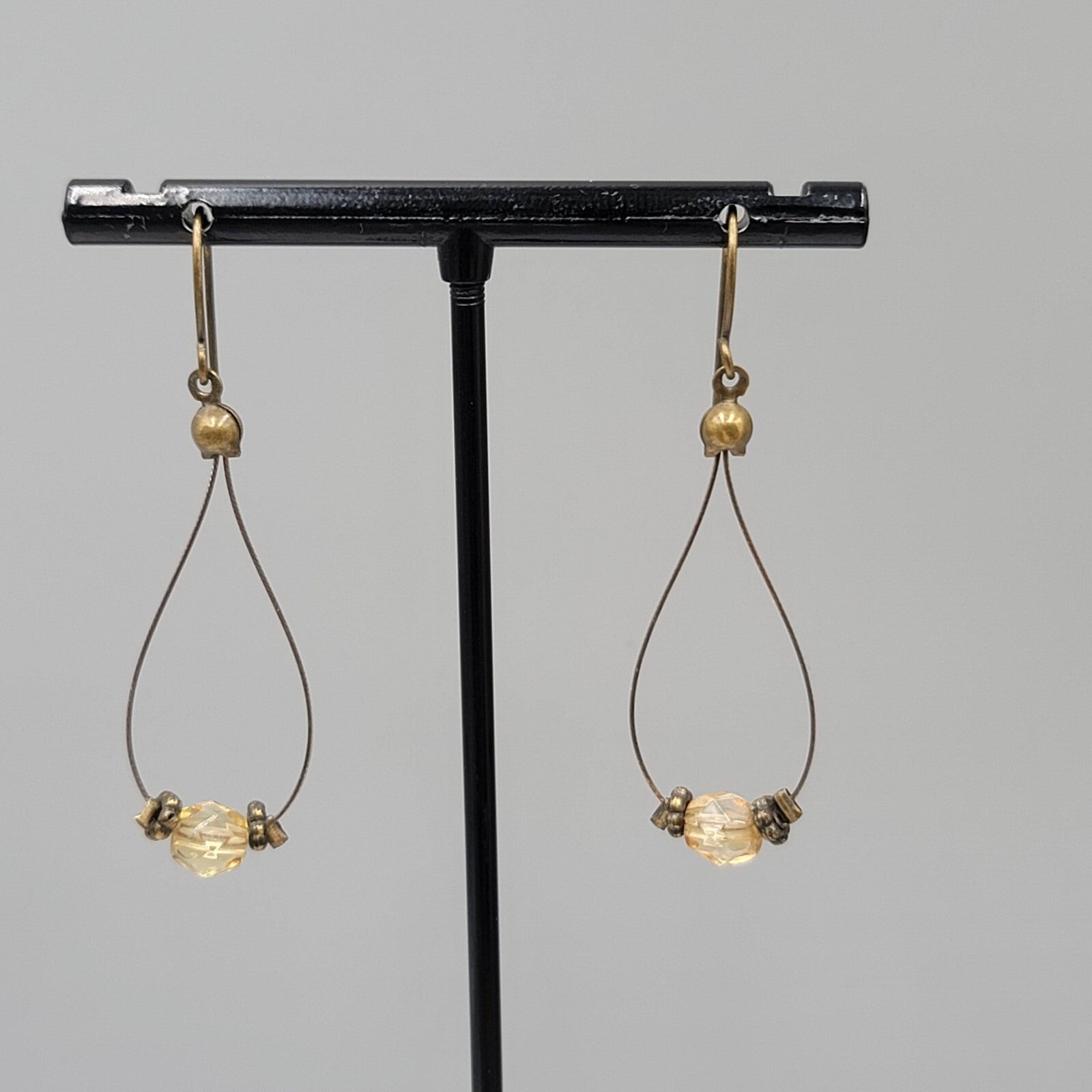 Pierced Earrings Bronze tone Teardrop Wire Yellow Glass Bead Dangle 1.5"
