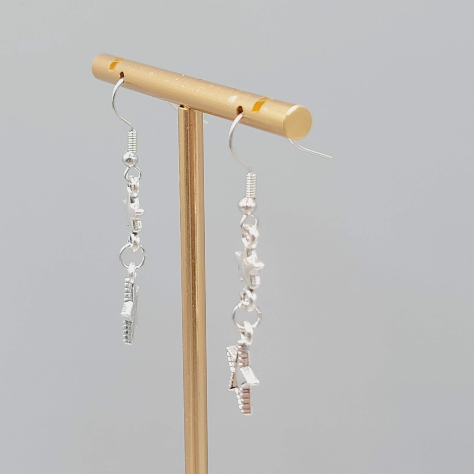 Stars Pierced Earrings Silver tone Embossed Dangle New 1 1/8"