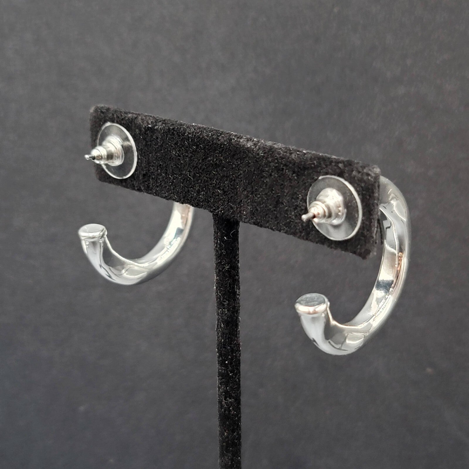 Pierced Earrings Polished Silver Plated Wavy Hoops Diamond Accent 1 1/8"