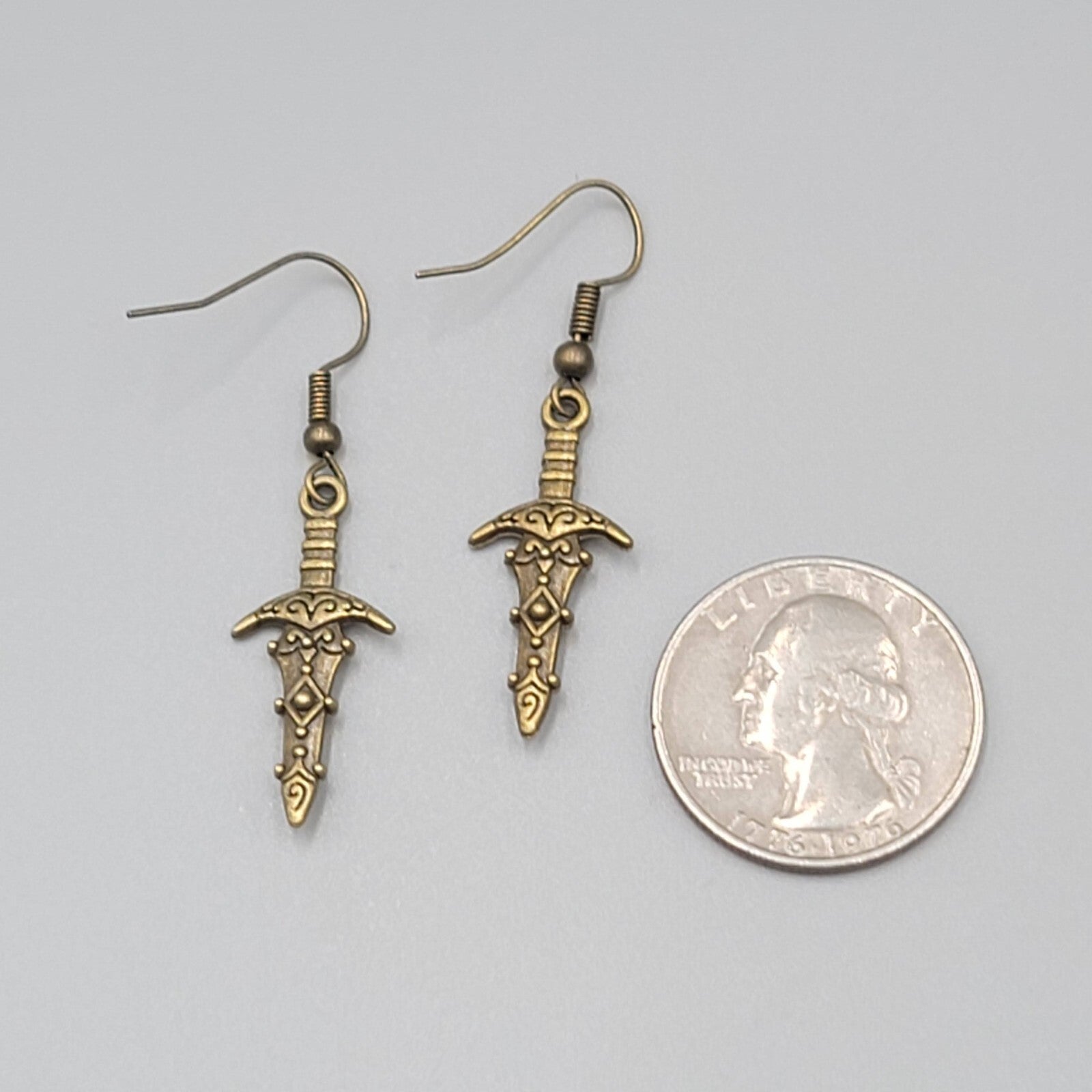 Fancy Embossed Dagger Pierced Earrings Bronze tone Dangle New 1"