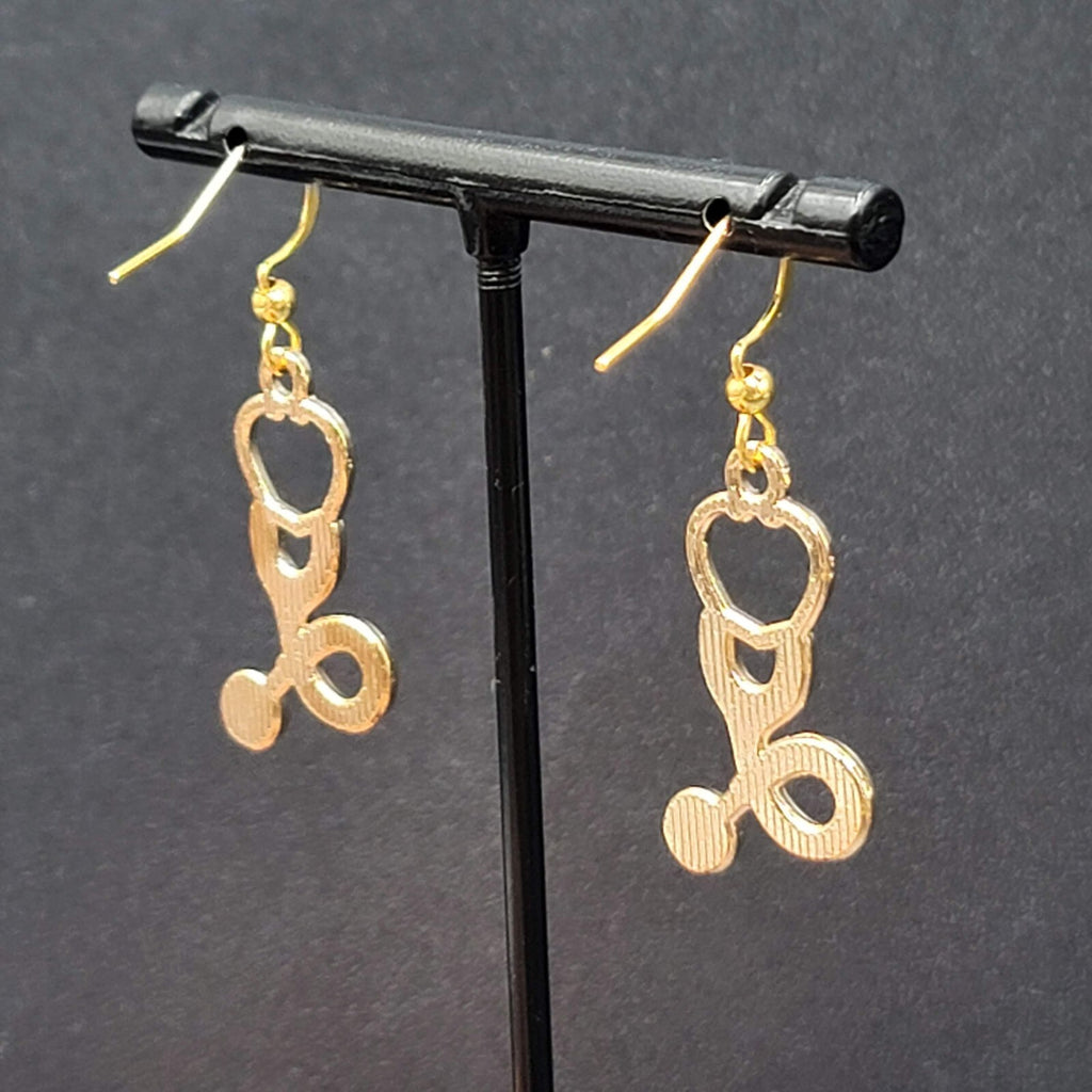 Nurse Pierced Earrings White Enamel Stethoscope Gold tone Dangle 1 1/8"