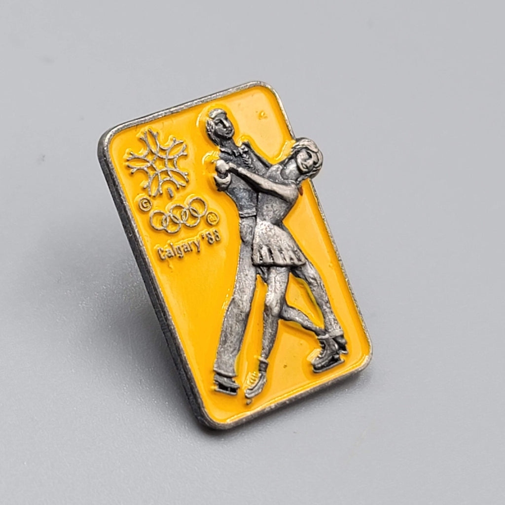 Calgary 88 Olympic Winter Games Lapel Pin Ice Skating Couples Yellow Enamel 1"