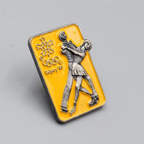 Calgary 88 Olympic Winter Games Lapel Pin Ice Skating Couples Yellow Enamel 1"