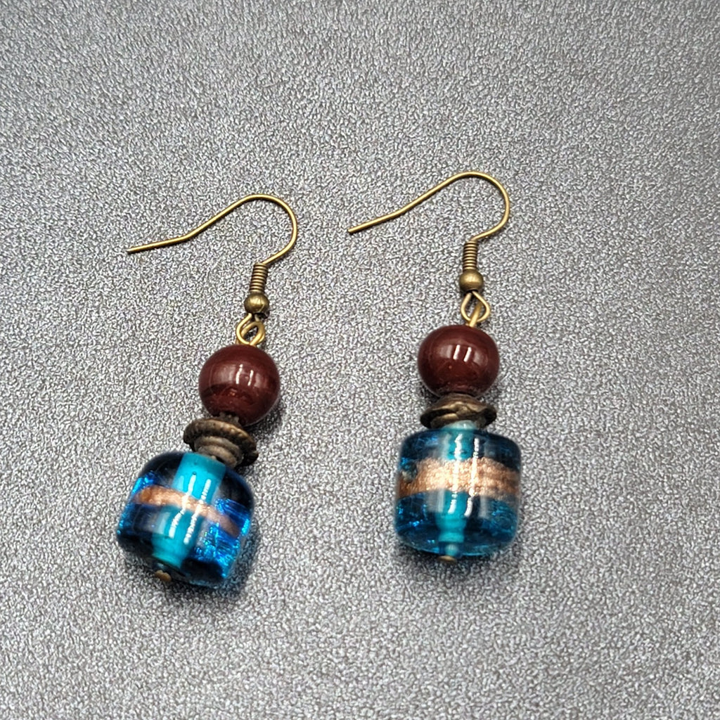 Pierced Earrings Bronze tone Art Glass Blue Bead Dangle 1.25"