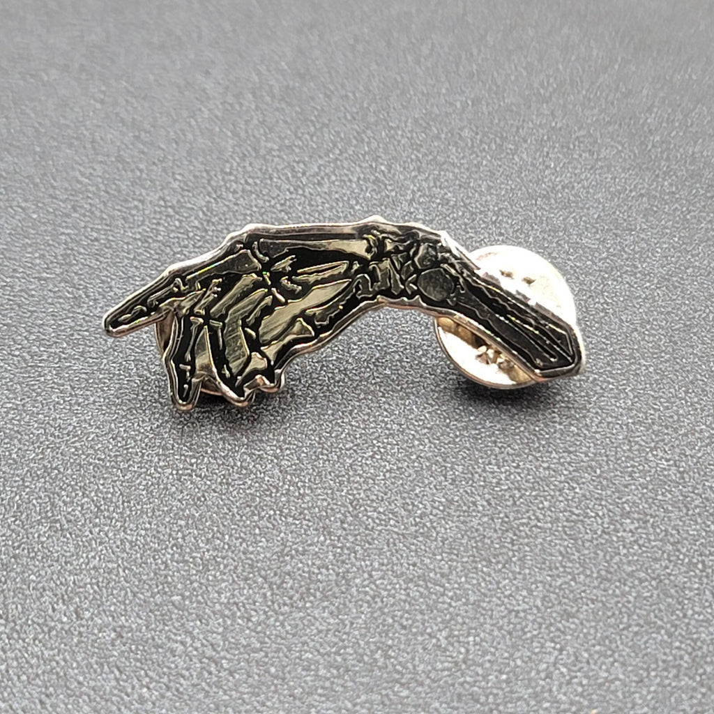 Skeleton Hand Pointing Lapel Pin Black Silver Goth Oddity 1.5"