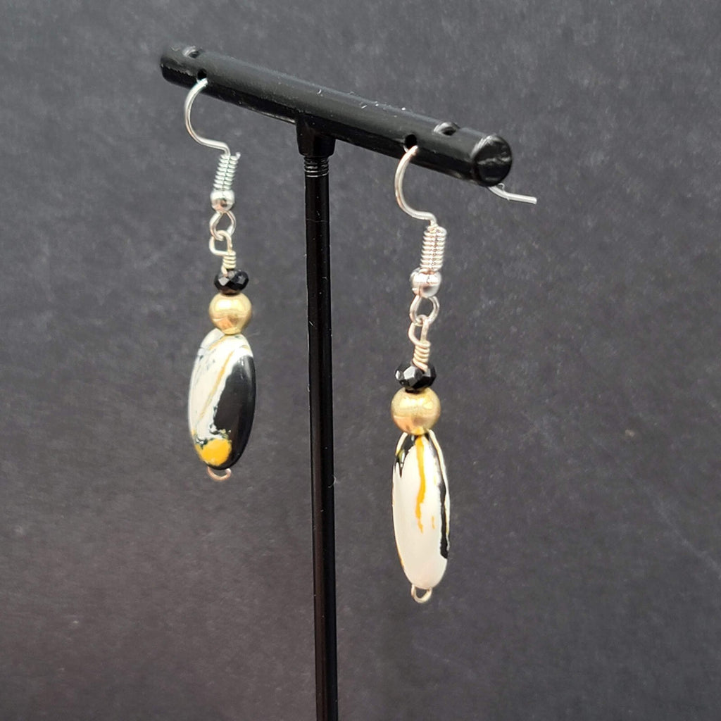 Pierced Earrings Silver tone Black White Yellow Art Glass Oval Bead Dangle 1.25"