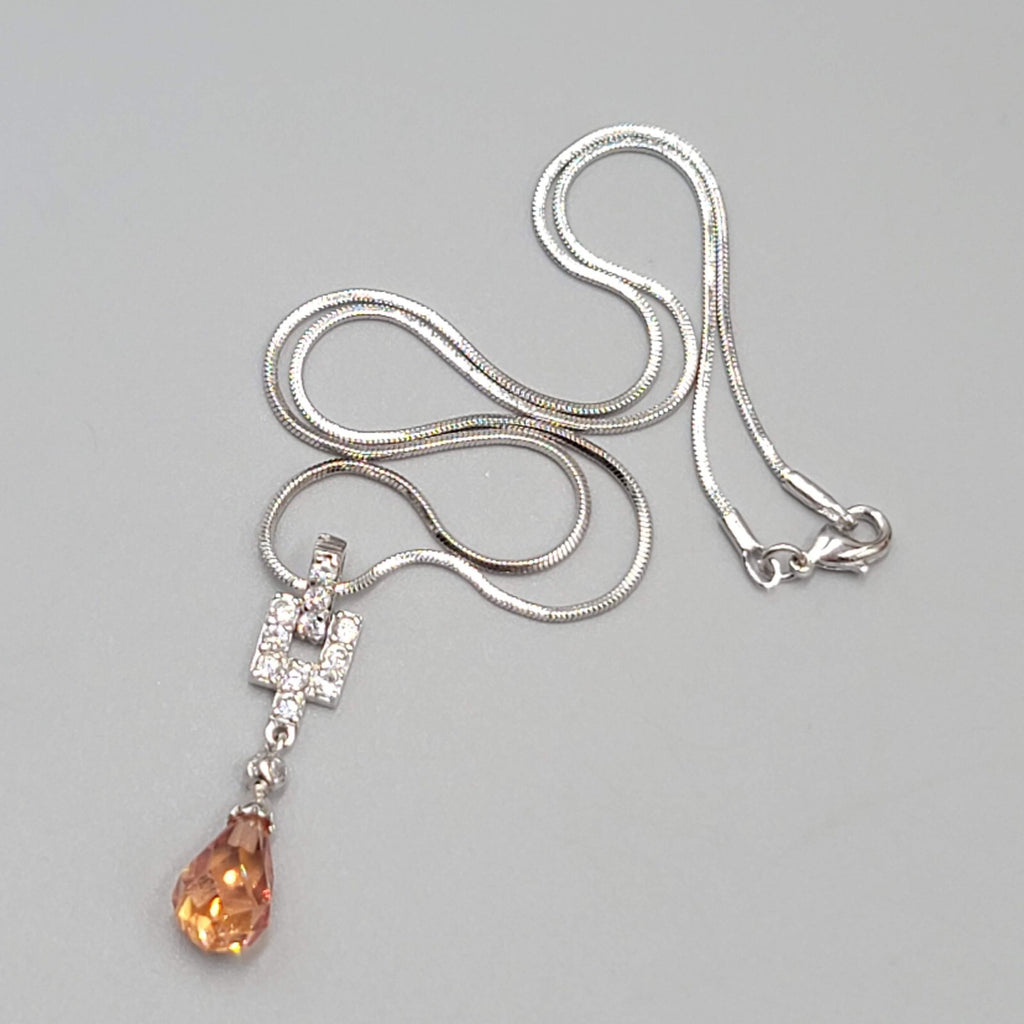 Orange Crystal Teardrop Pendant Necklace Silver tone Snake Chain 15"
