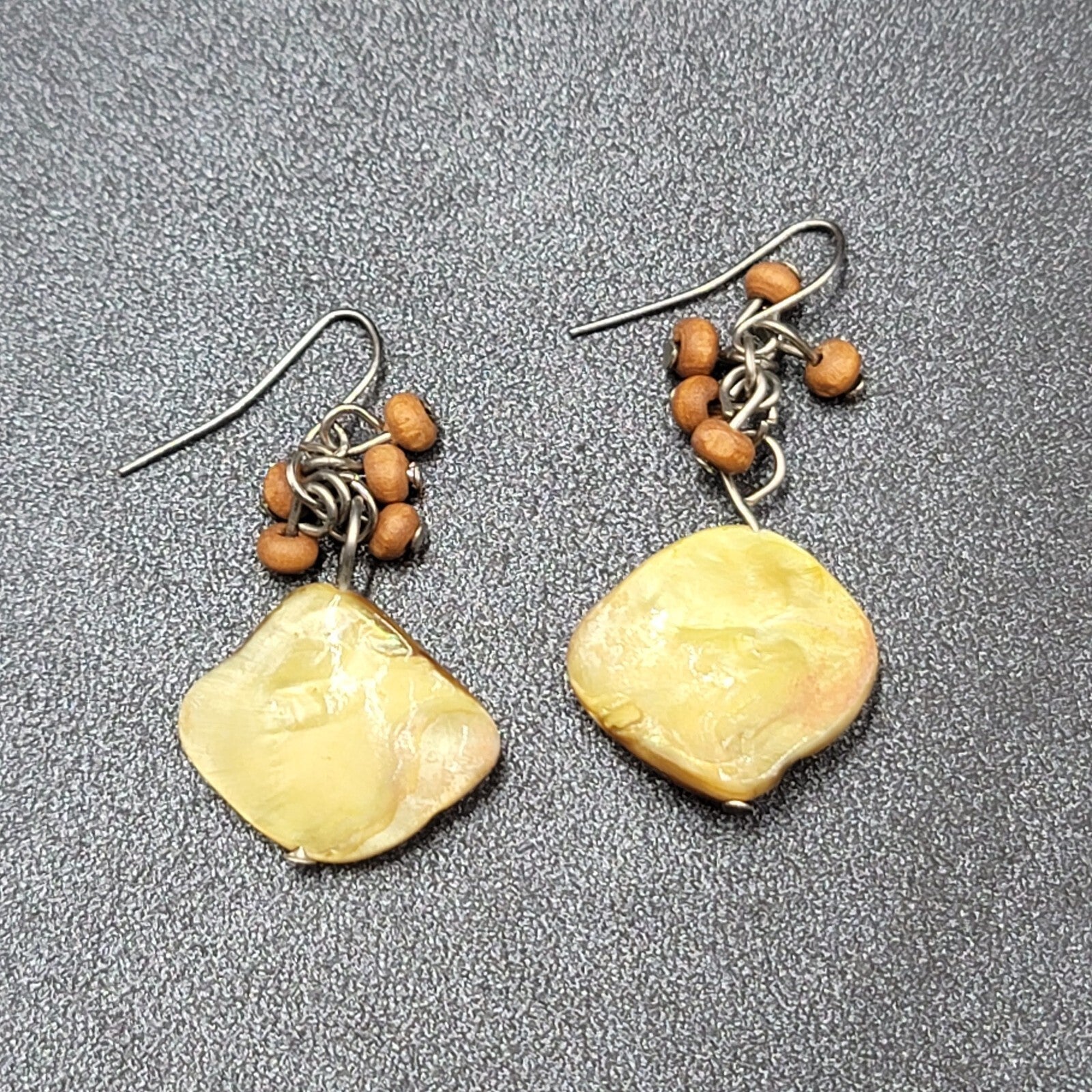 Pierced Earrings Silver tone Yellow Shell Wood Bead Dangle 1.25"
