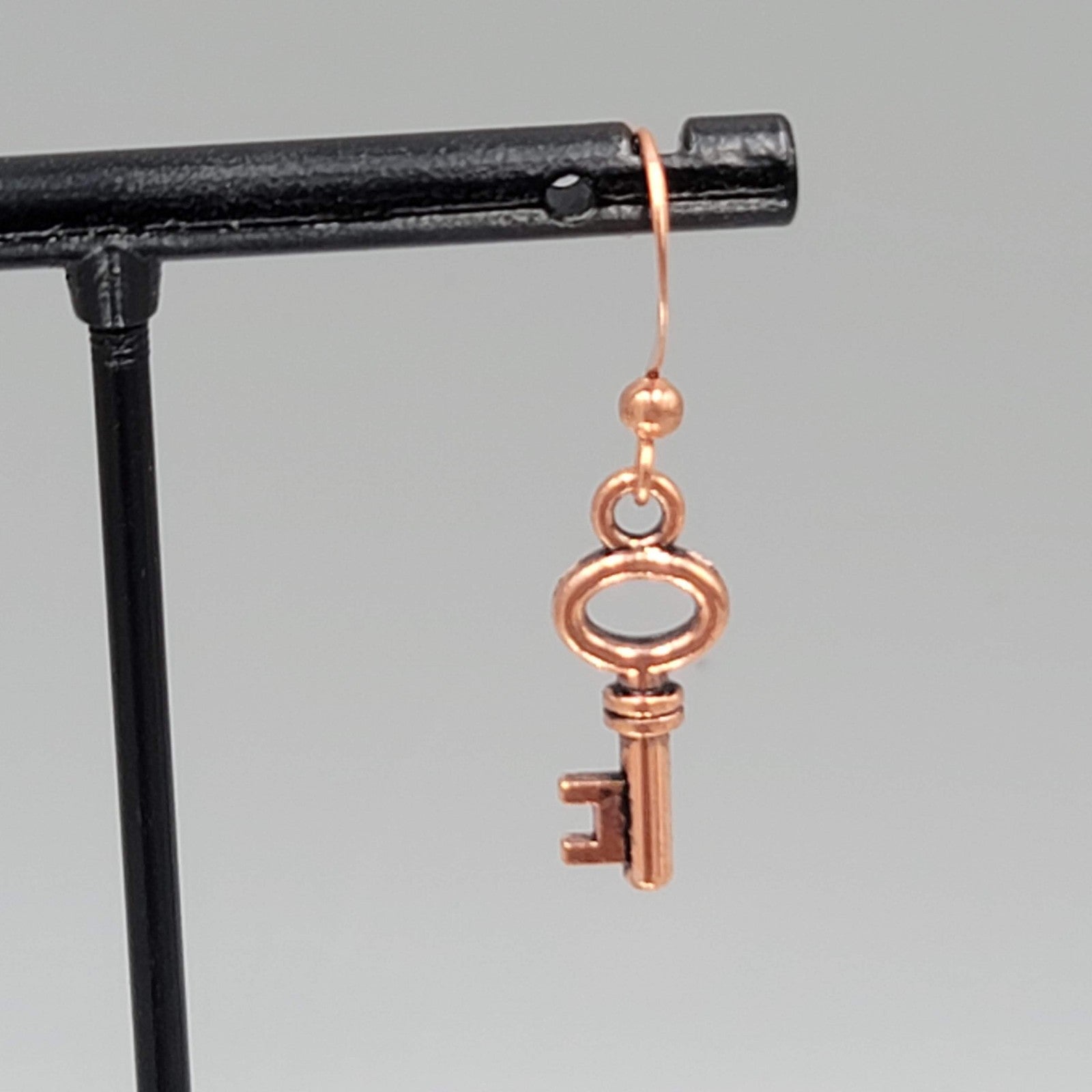 Copper tone Skeleton Key Pierced Earrings Dangle Small 3/4"