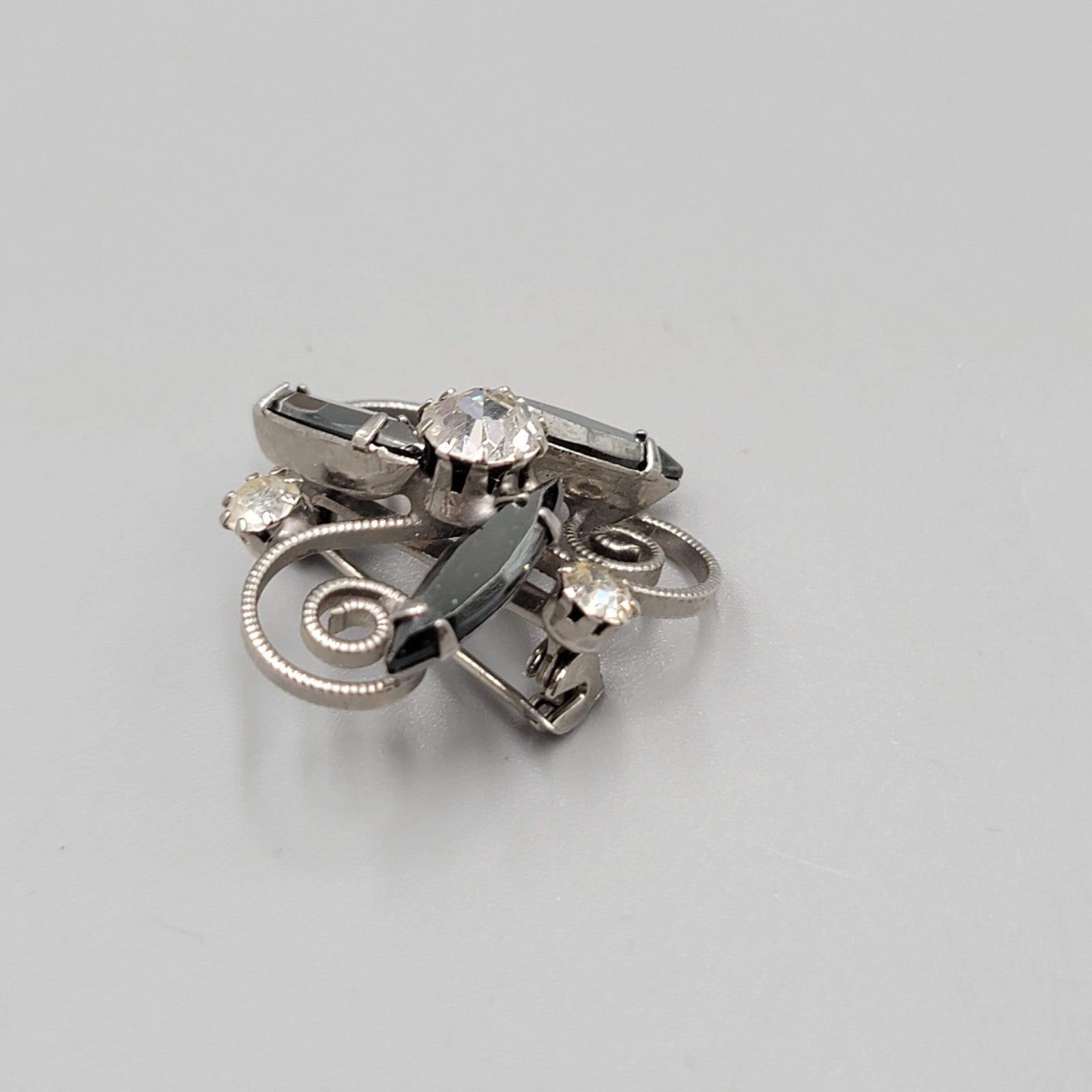 Vintage Black Hematite Rhinestone Brooch Silver tone Swirl 1 in