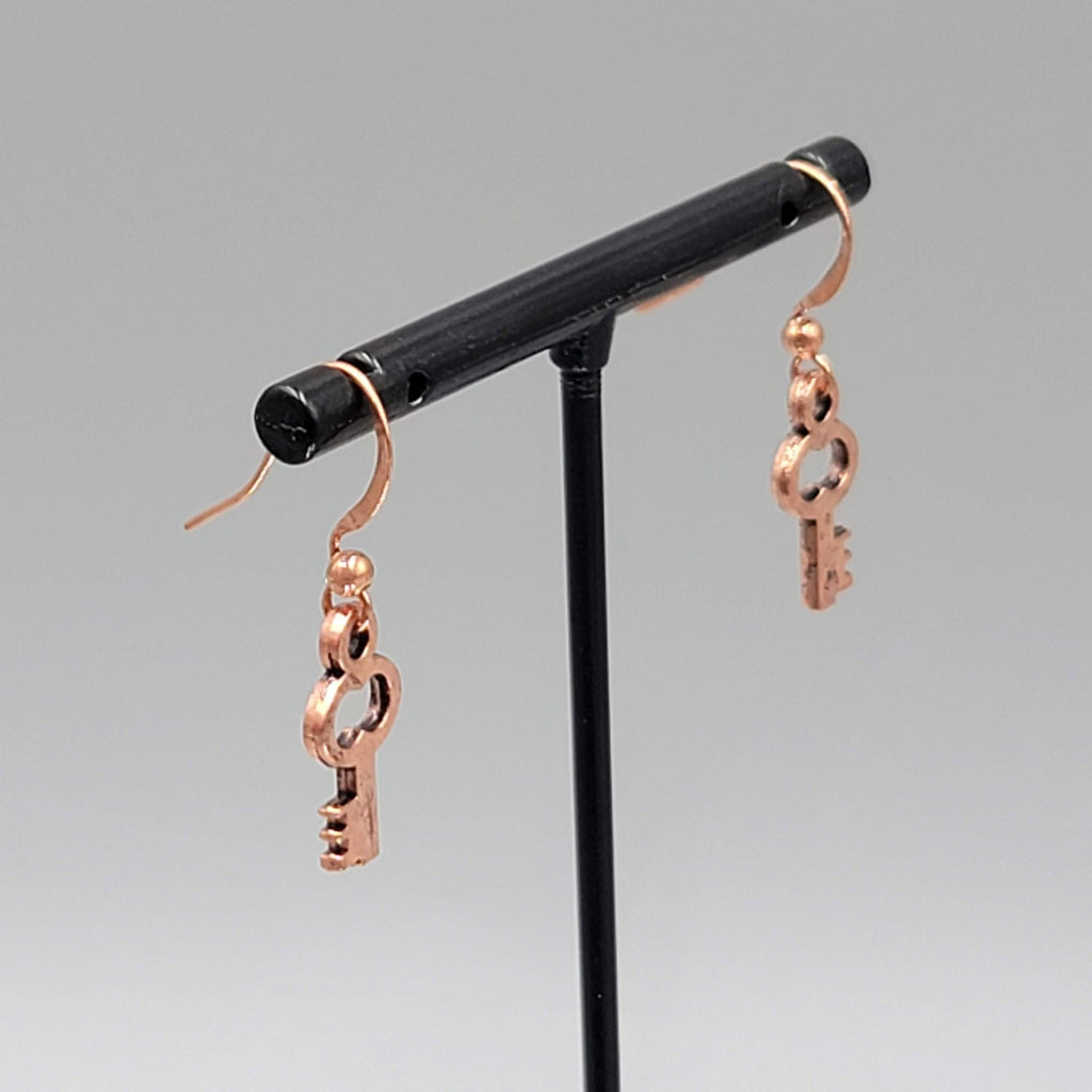 Small Copper tone Skeleton Key Pierced Earrings Dangle 5/8"