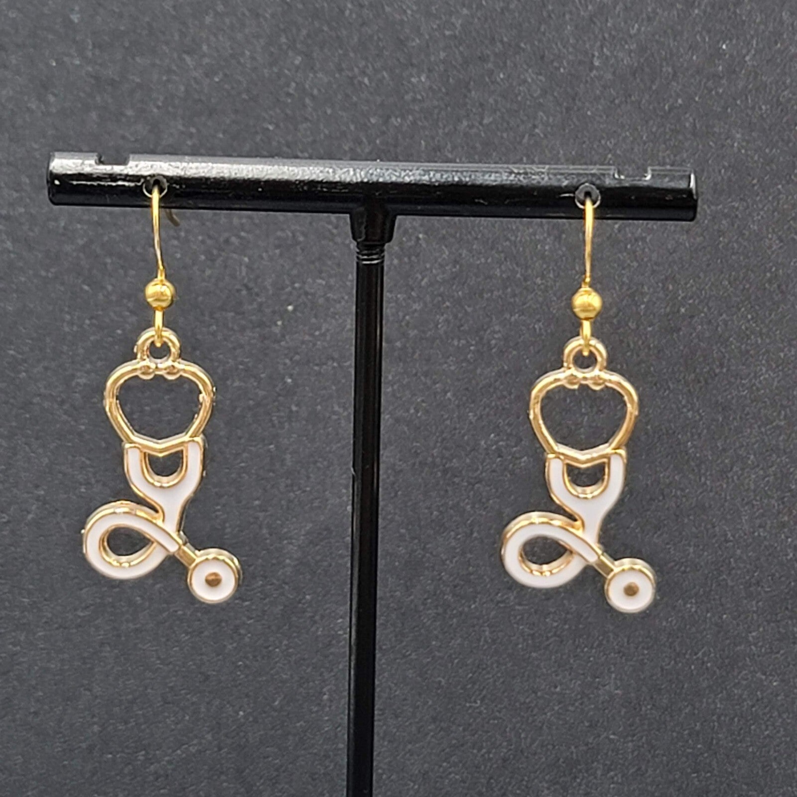 Nurse Pierced Earrings White Enamel Stethoscope Gold tone Dangle 1 1/8"