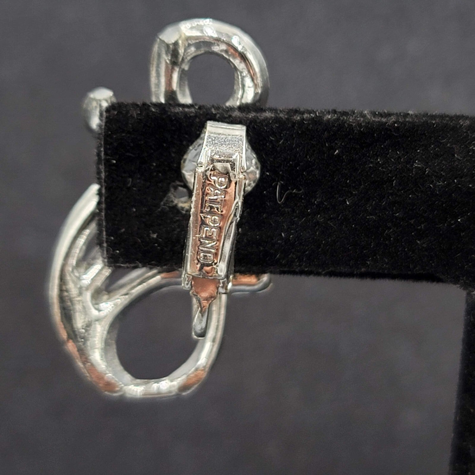 Vintage Clip on Earrings Pat Pend Silver tone Swirl Climber 1.25"
