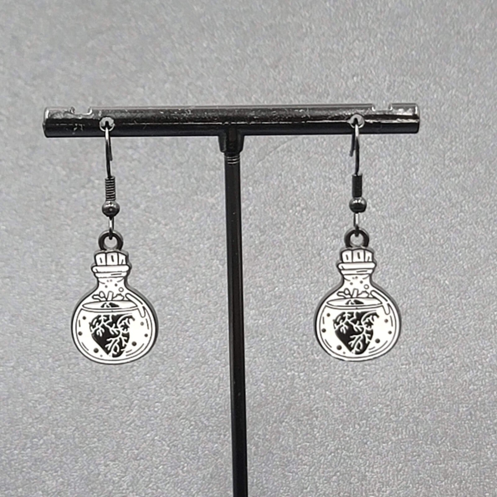 Poison Heart in Jar Pierced Earrings Black White Enamel Dangle 7/8" 