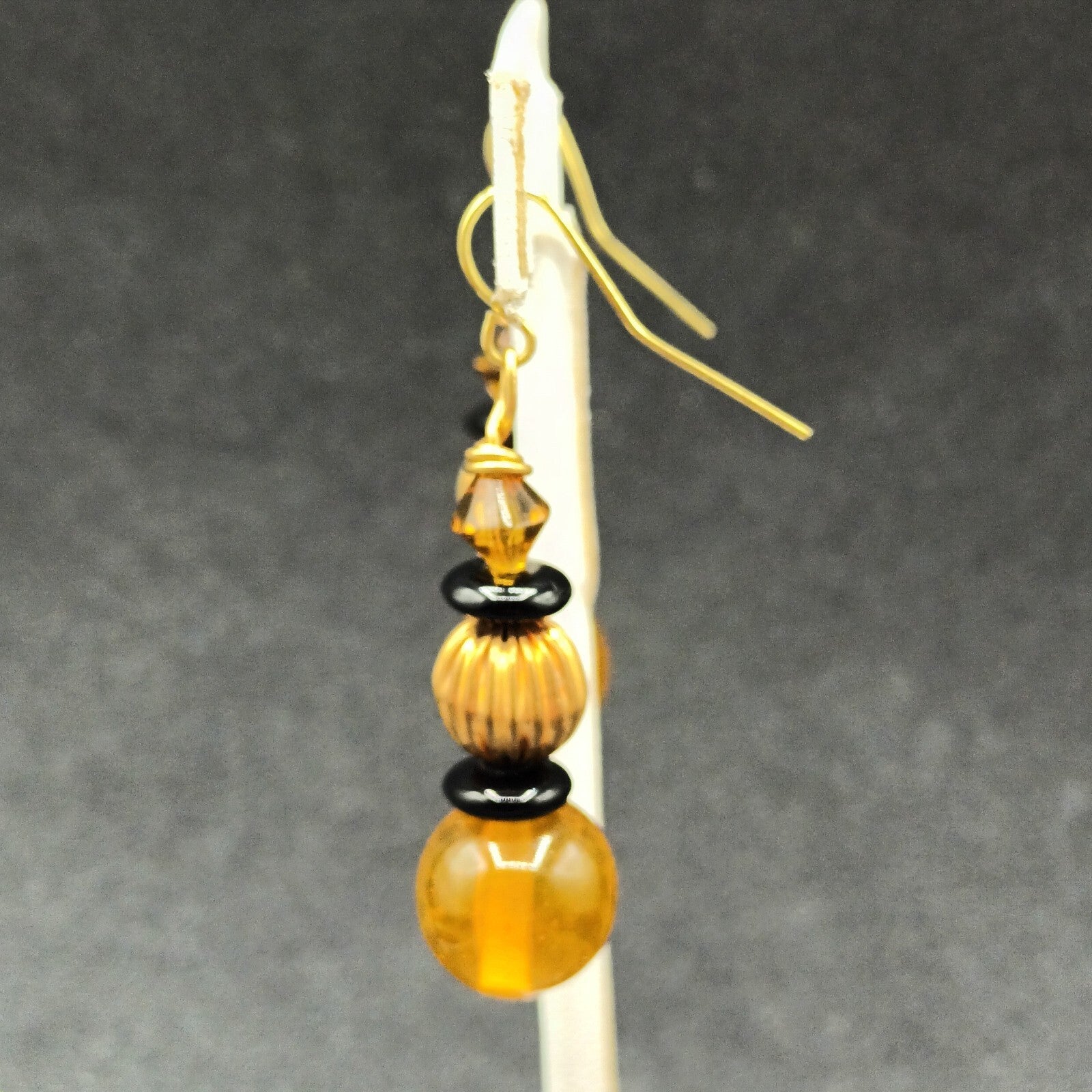 Pierced Earrings Gold tone Orange Black Beaded Statement Dangle 1.5"