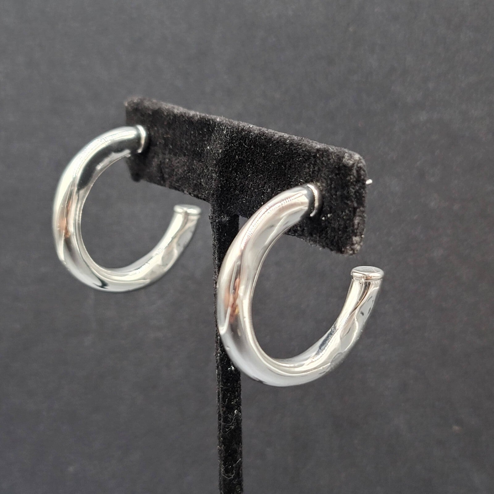 Pierced Earrings Polished Silver Plated Wavy Hoops Diamond Accent 1 1/8"