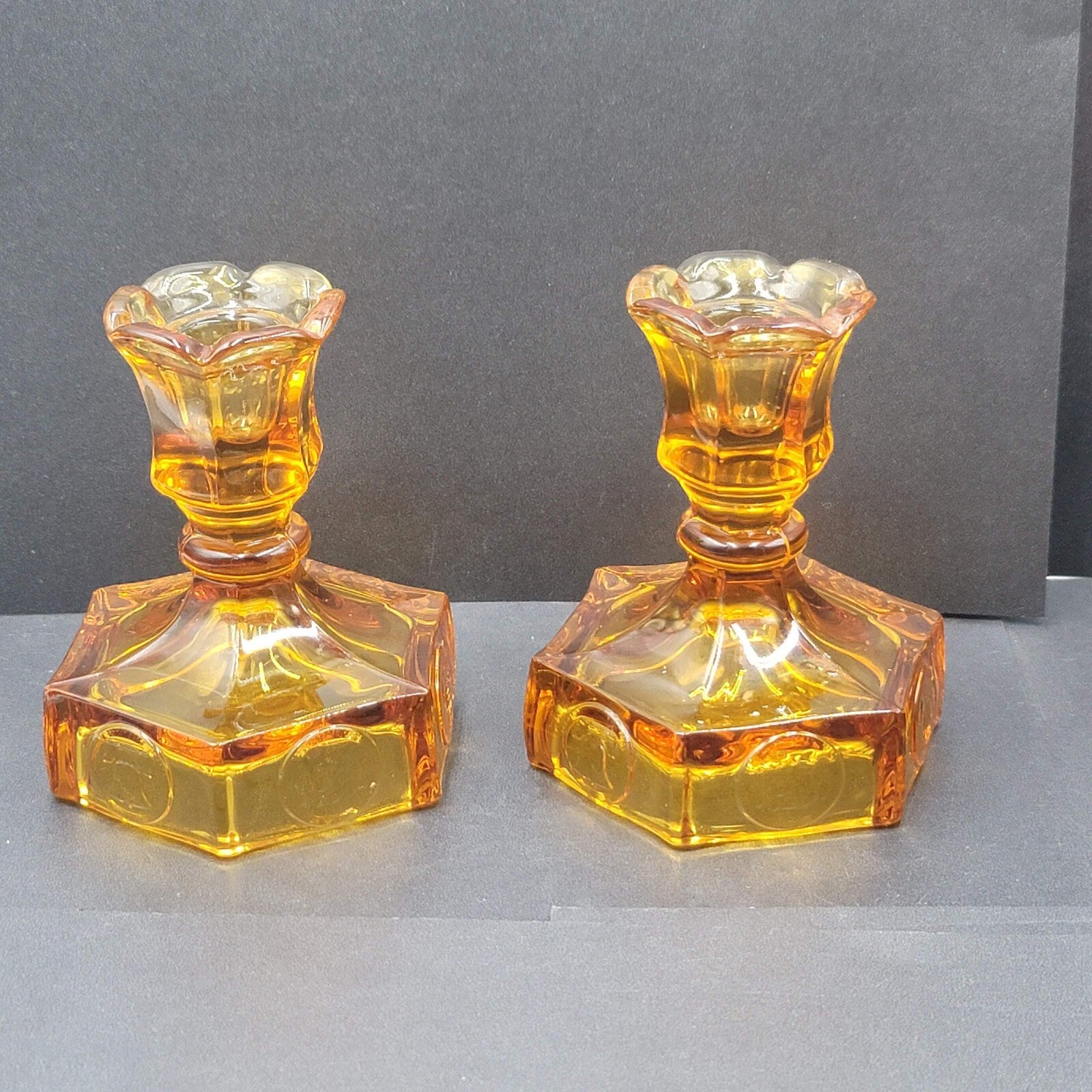 Pair Of Vintage Fostoria Amber Coin Glass Candle Stick Holders