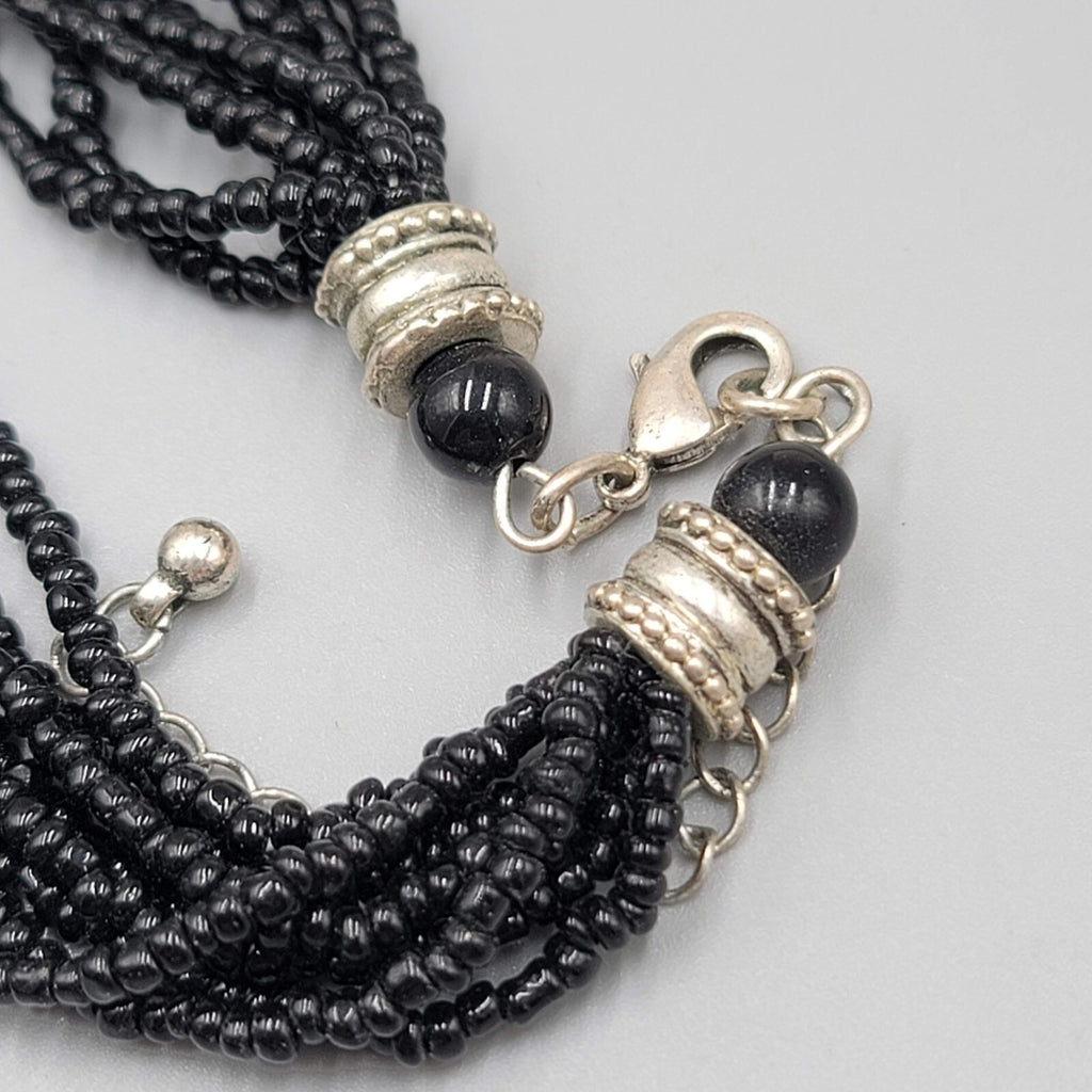 Multi Strand Black Seed Bead Necklace Oval Pendant Silver tone 18"