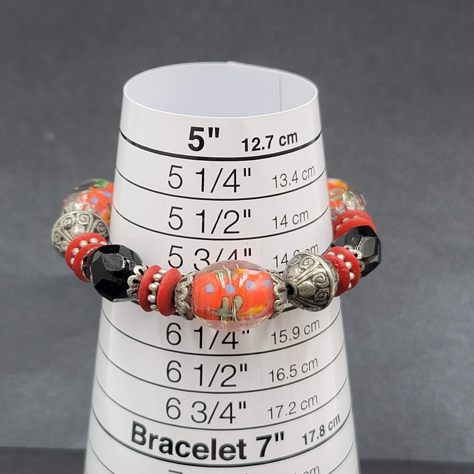 Beaded Bracelet Art Glass Red Black Silver tone Embossed Beads Elastic 6"