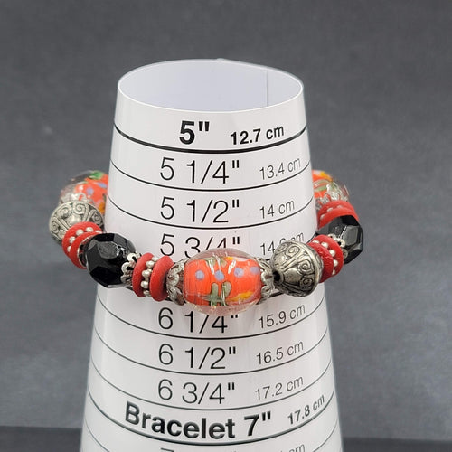 Beaded Bracelet Art Glass Red Black Silver tone Embossed Beads Elastic 6"