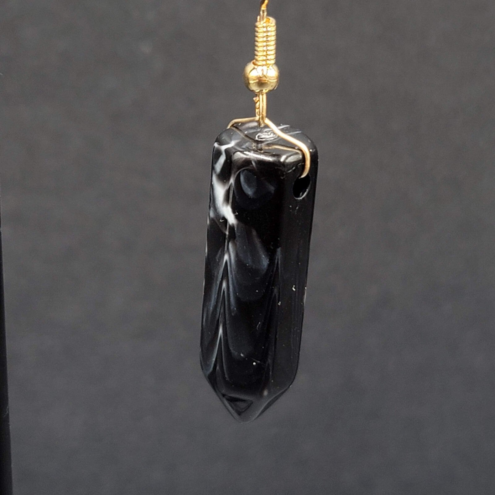 Pierced Earrings Black Marbled Resin Spike Pendulum Dangle Gold tone Hook 1.25"