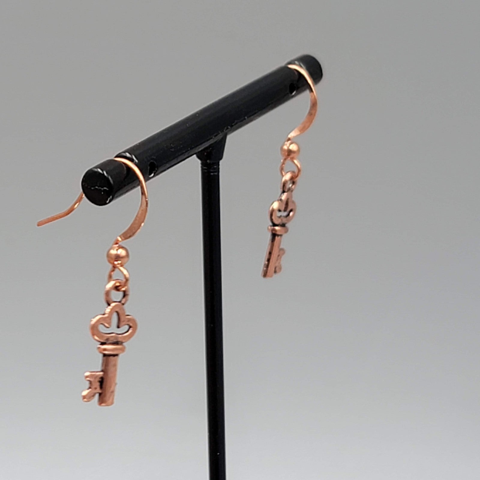 Copper tone Skeleton Key Pierced Earrings Dangle 5/8"