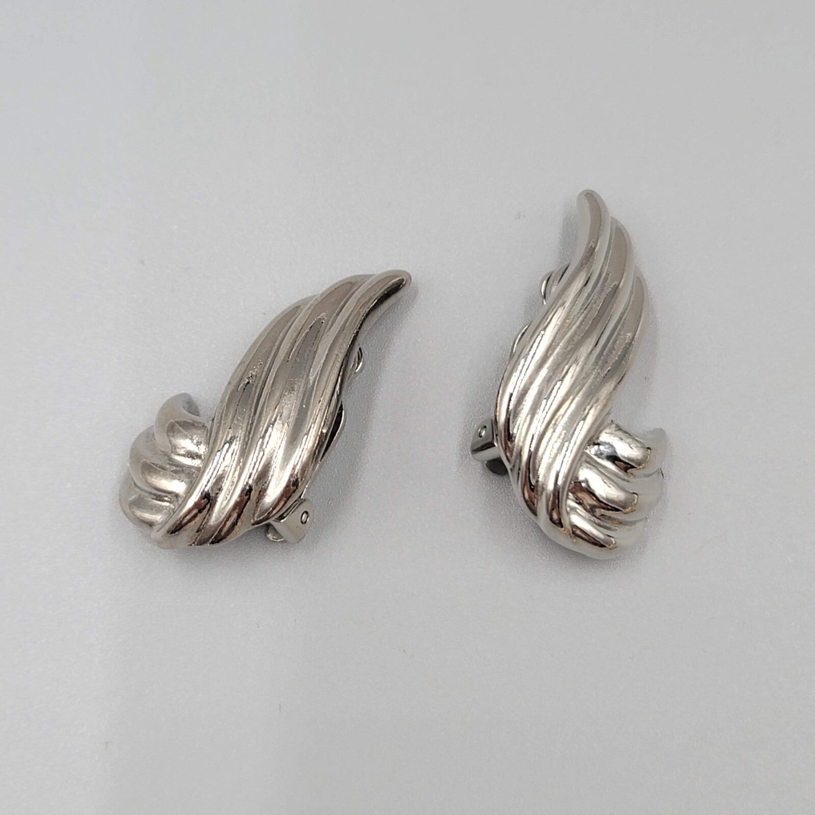 Vintage Clip on Earrings Silver tone Swirl Climber 1 3/8"