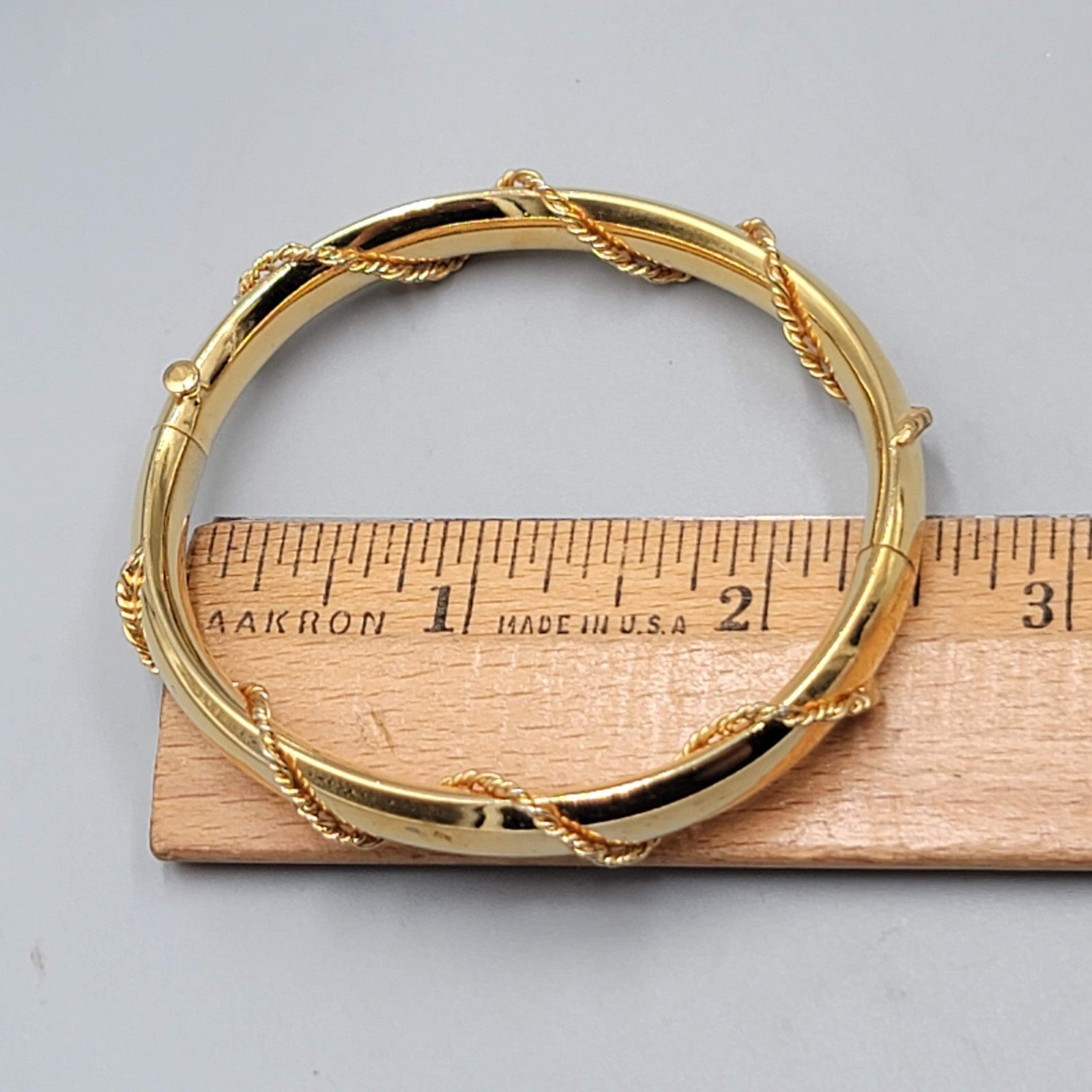 Vintage Hinged Oval Bracelet Gold tone Twist Accent Design 6.75 in