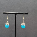 Pierced Earrings Silver tone Filigree Capped Blue Glass Bead Dangle 3/4"