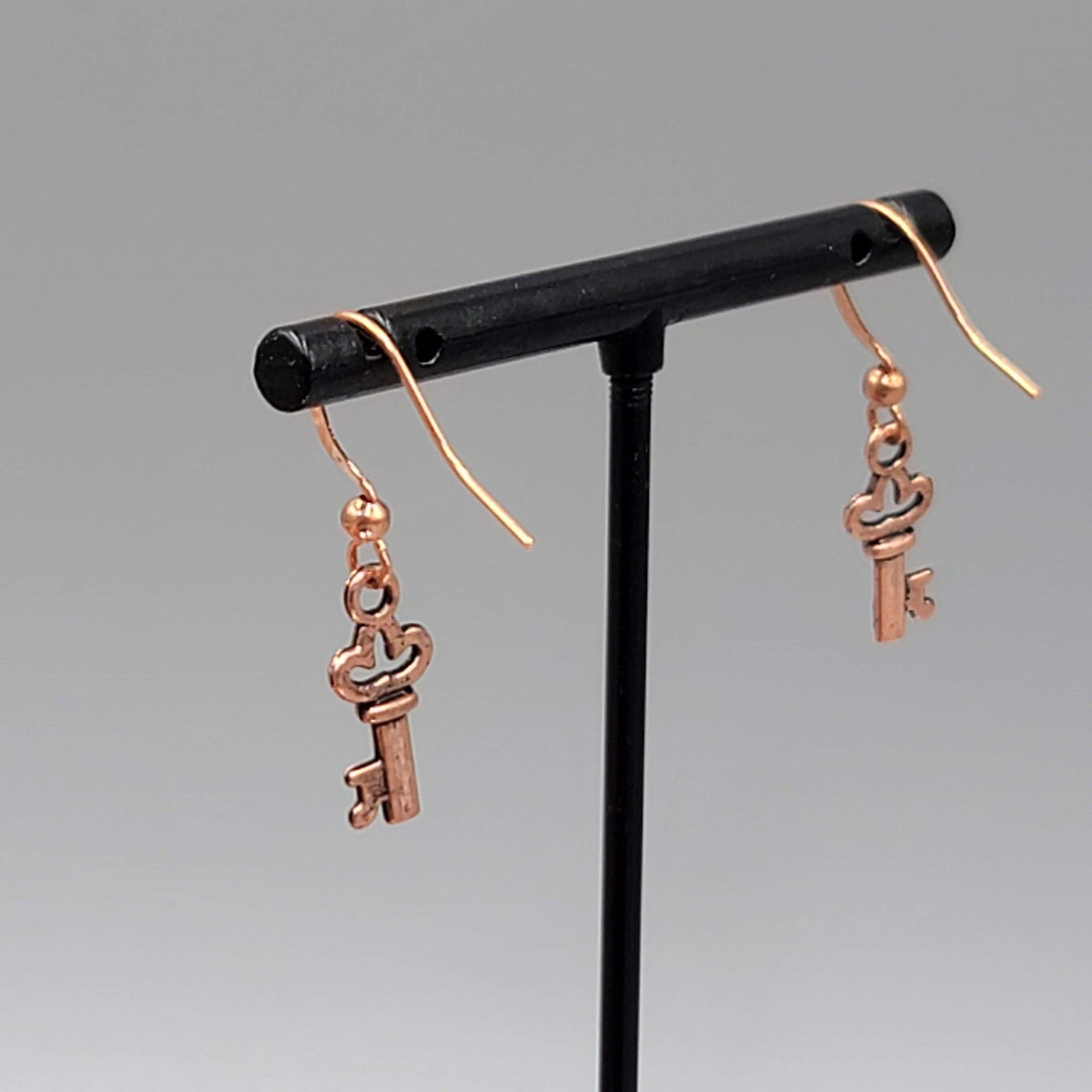 Copper tone Skeleton Key Pierced Earrings Dangle 5/8"