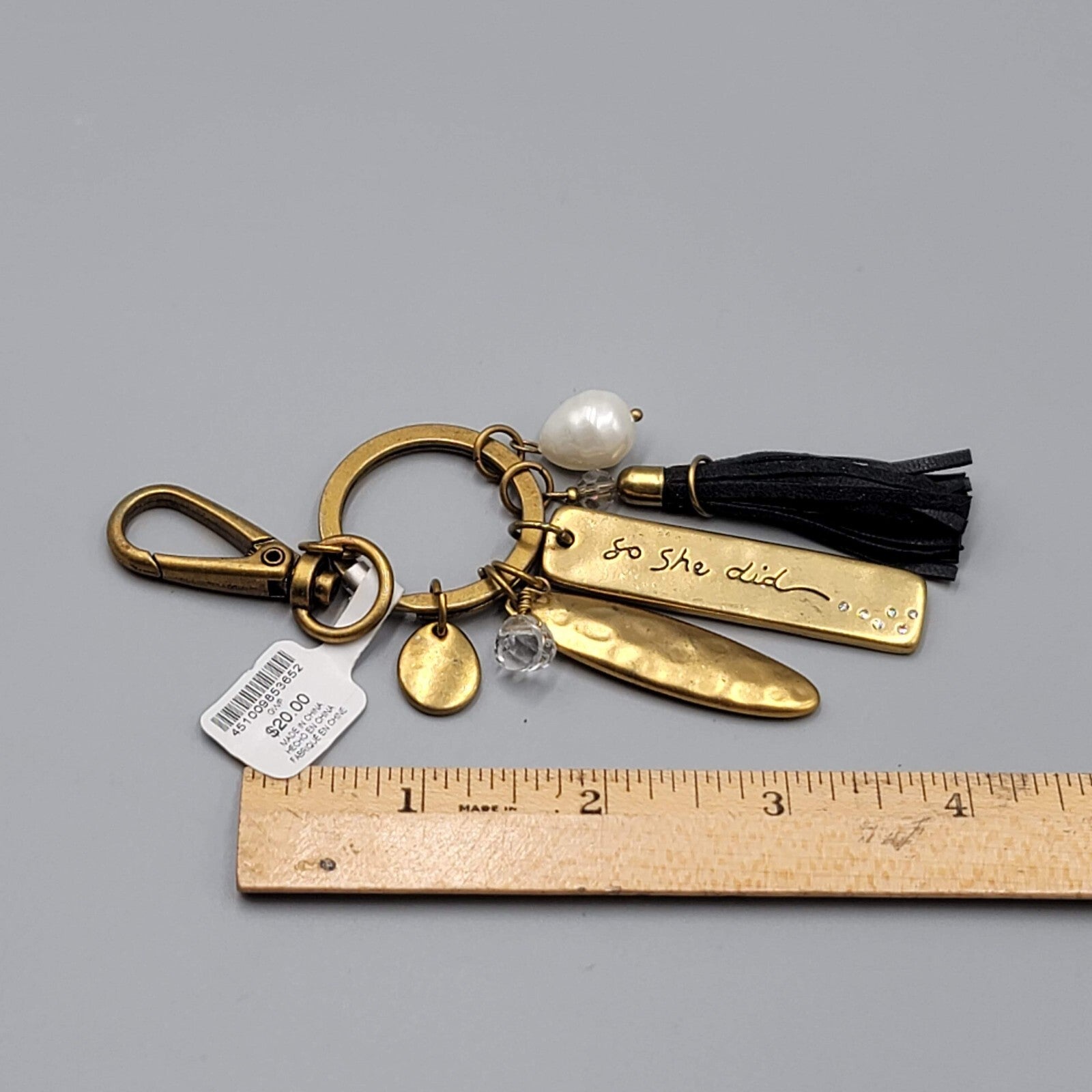 Chicos Keychain SHE BELIEVED SHE COULD Charm keychain Gold tone Black Tassel NWT