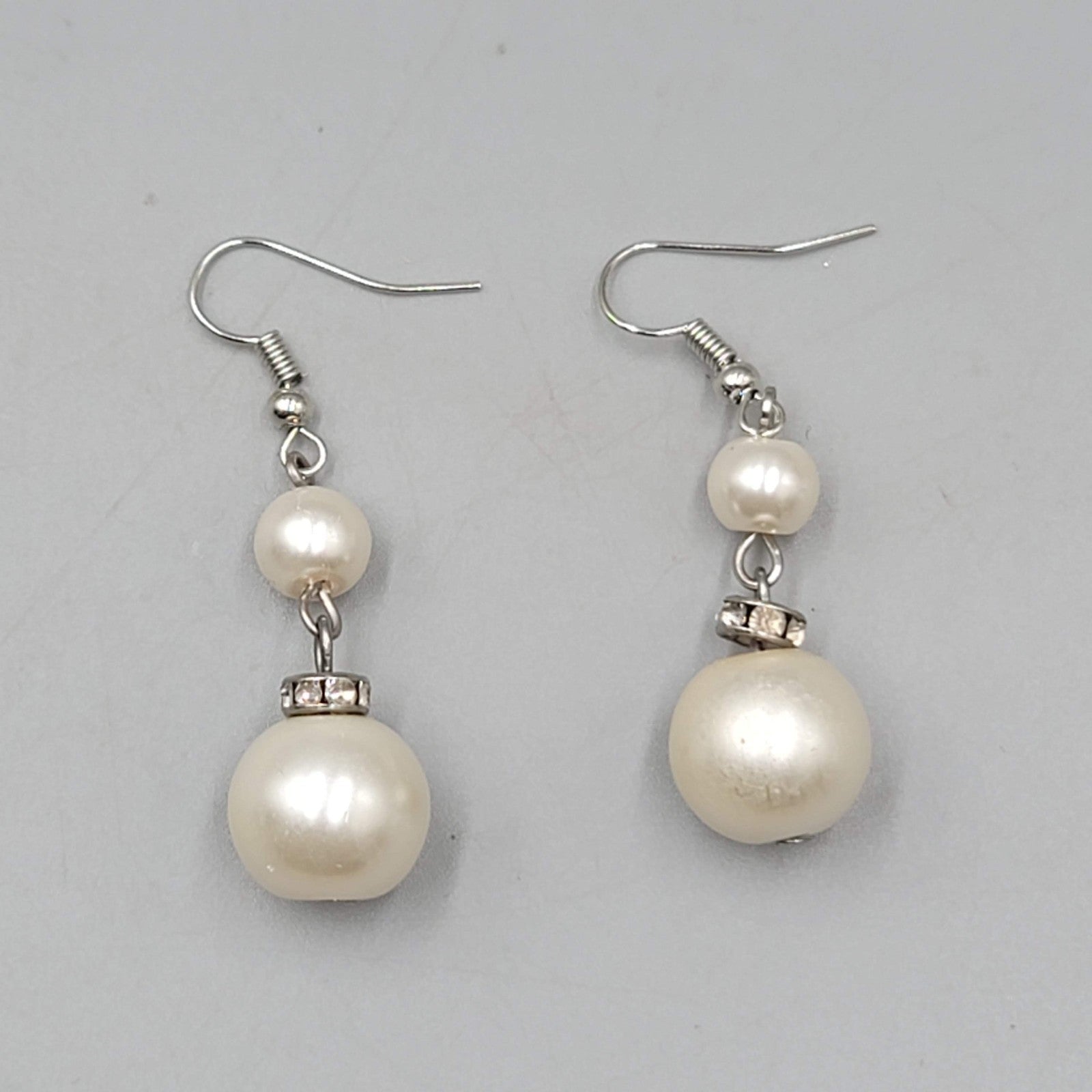 Satin Look White Bead Pierced Earrings Silver tone Dangle 1.25 in