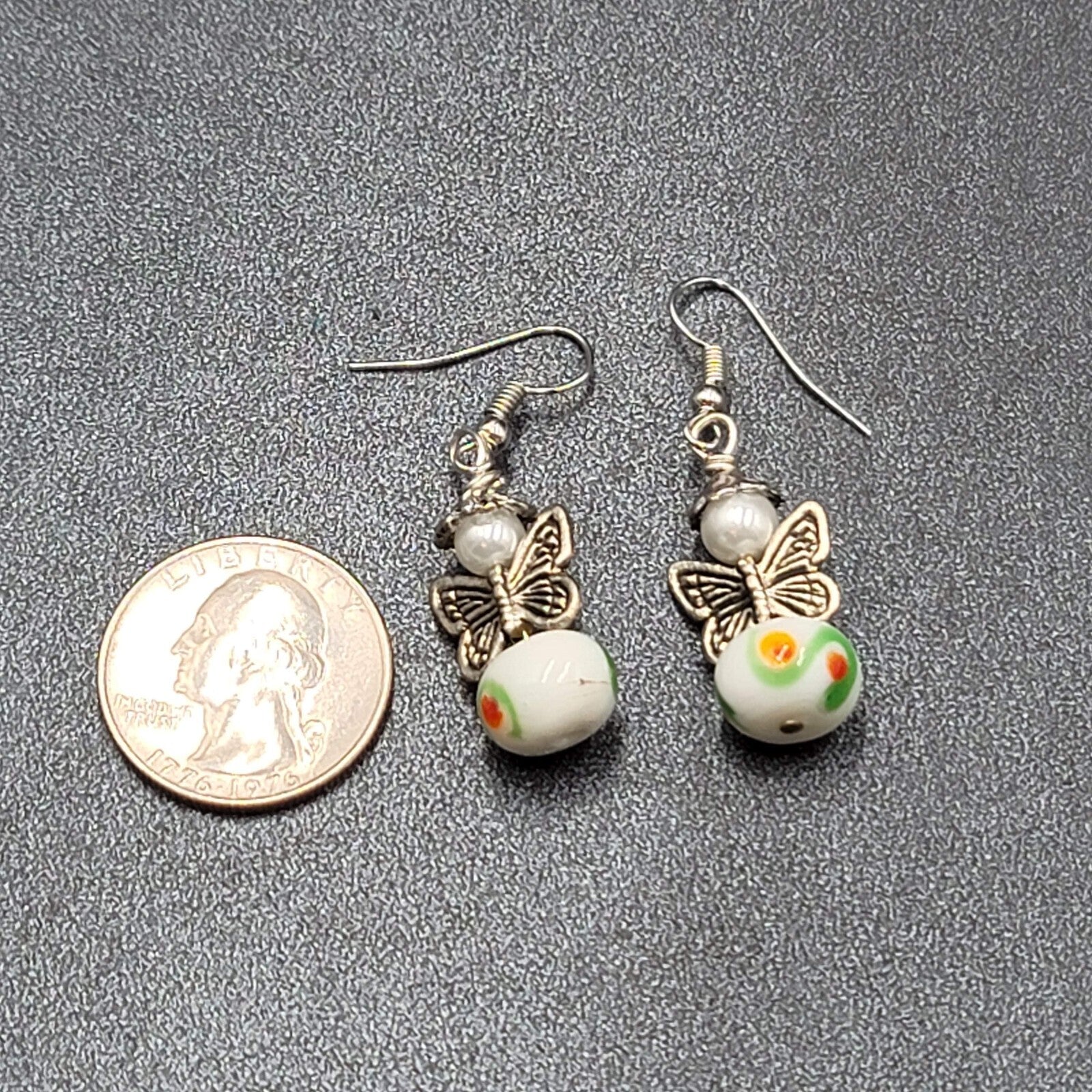 Pierced Earrings Silver tone Angel White Art Glass Bead Dangle 1"