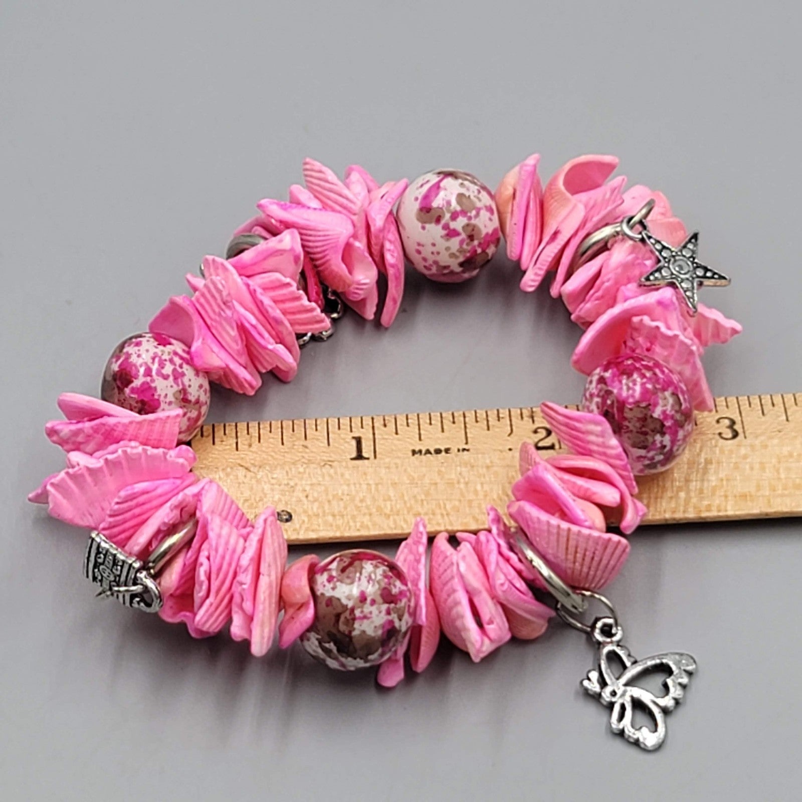 Hot Pink Shell Bracelet Silver tone Charms Elastic Statement 7.5"