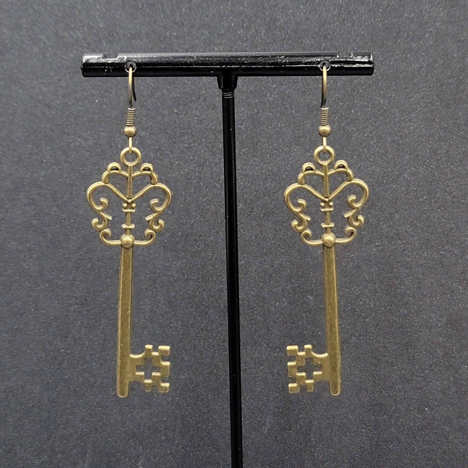 Pierced Earrings Bronze tone Long Antique Skeleton Key Dangle 2.25"