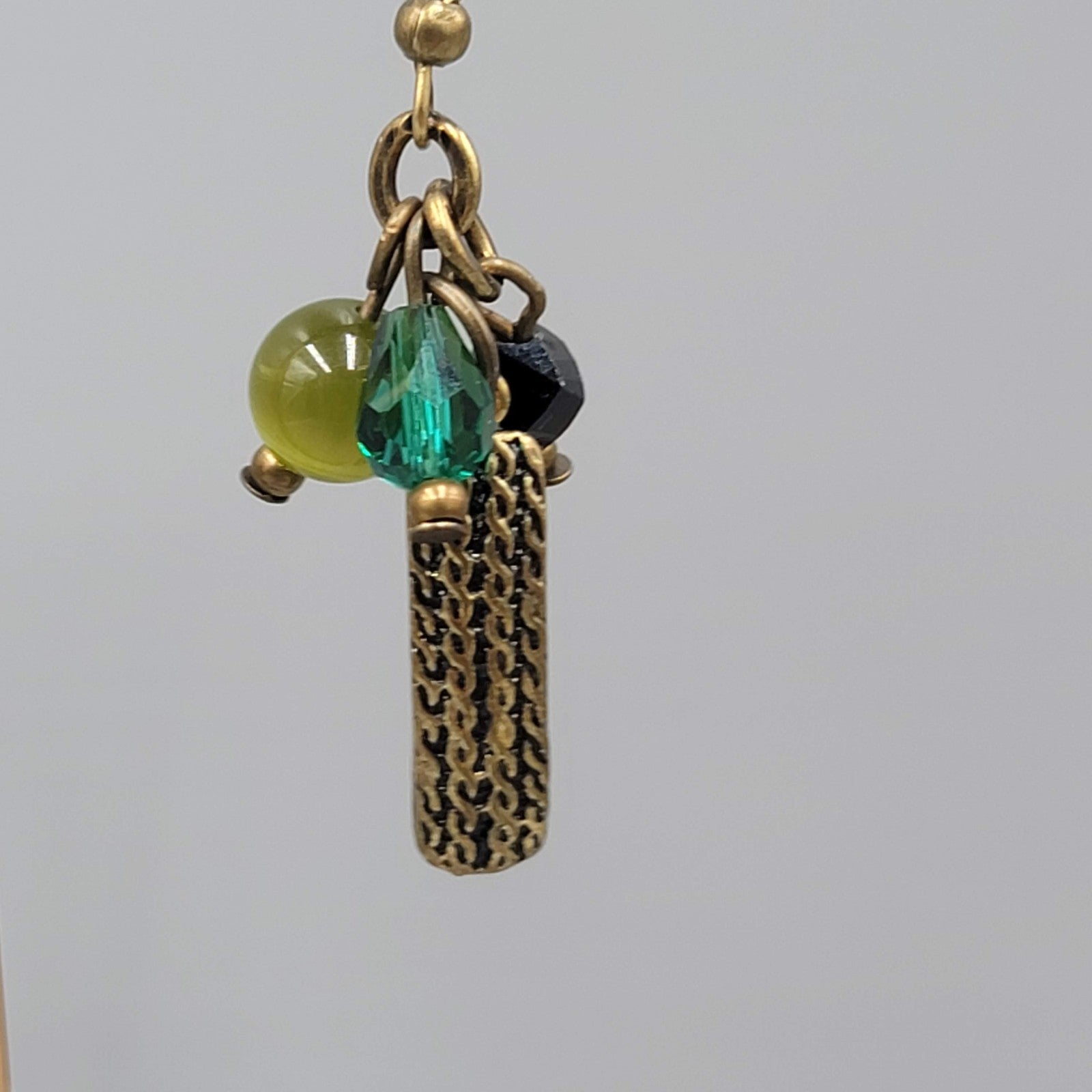 Green Black Glass Bead Pierced Earrings Bronze tone Dangle 1.25 in