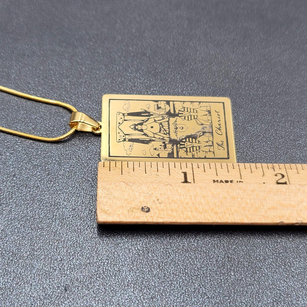 The CHARIOT Tarot Card Pendant Necklace Major Arcana Gold tone 18”.
