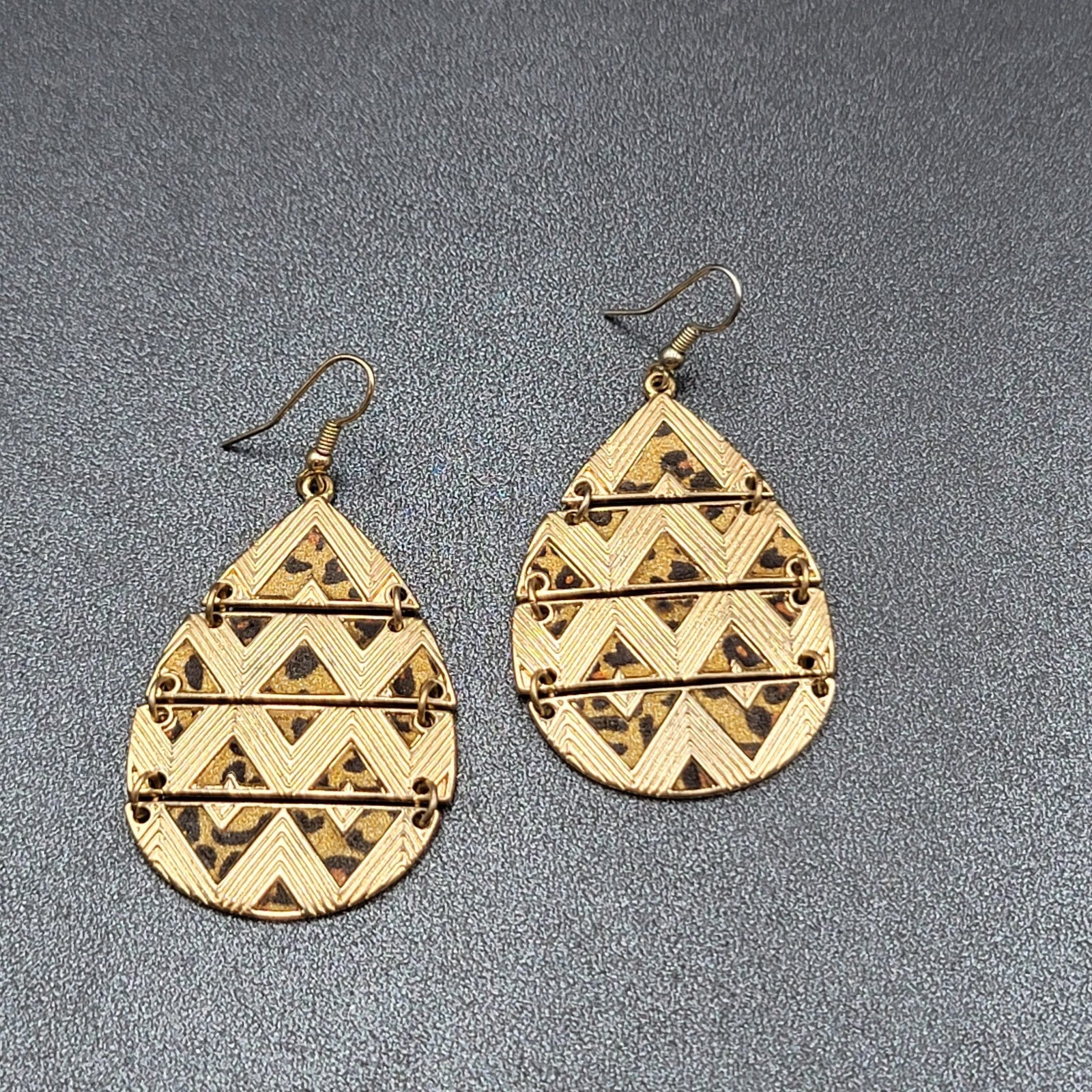 Pierced Earrings Gold tone Articulated Metal Teardrop Leopard Print Dangle 2"