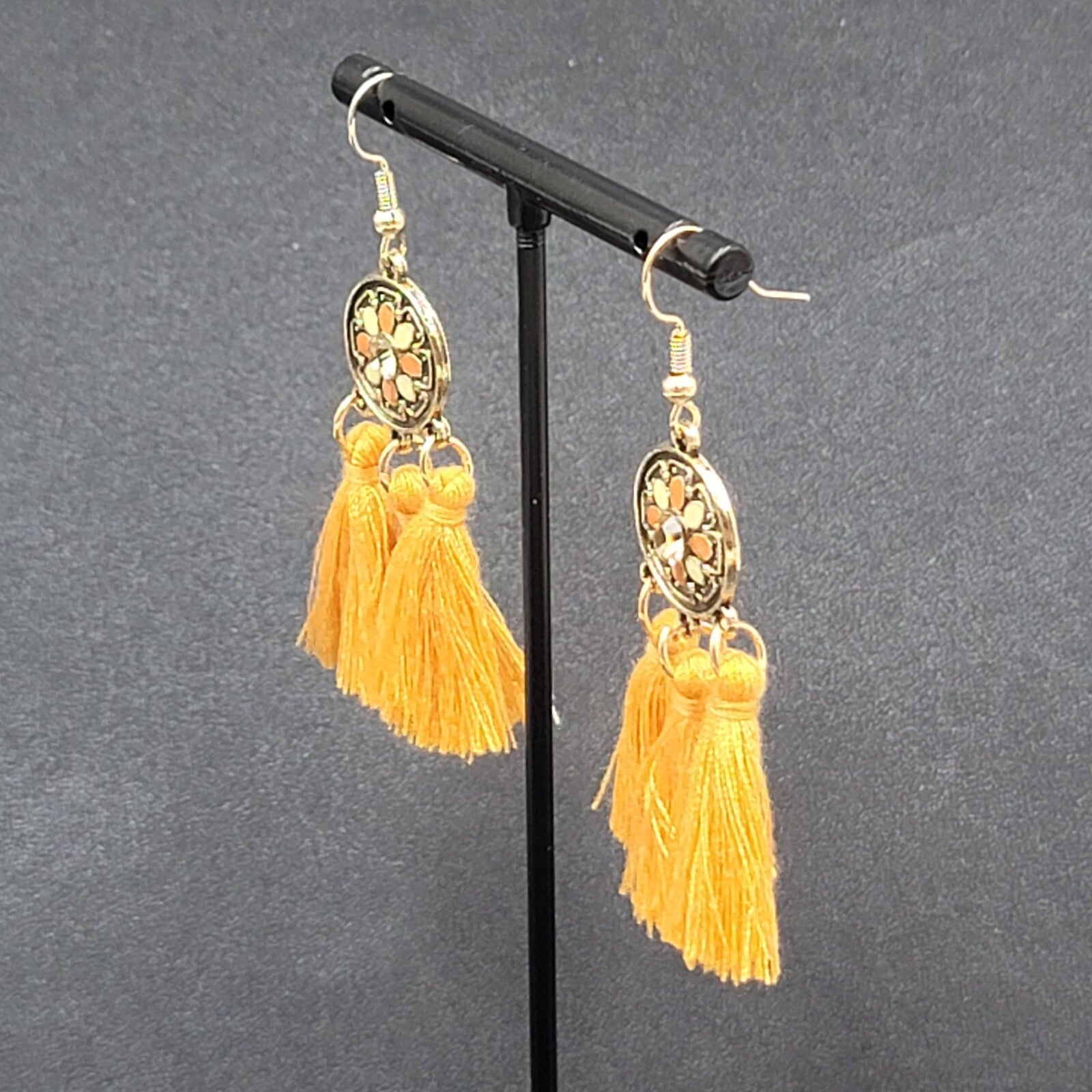 Pierced Earrings Gold tone Orange Tassel Rhinestone Medallion Dangle 1.75"