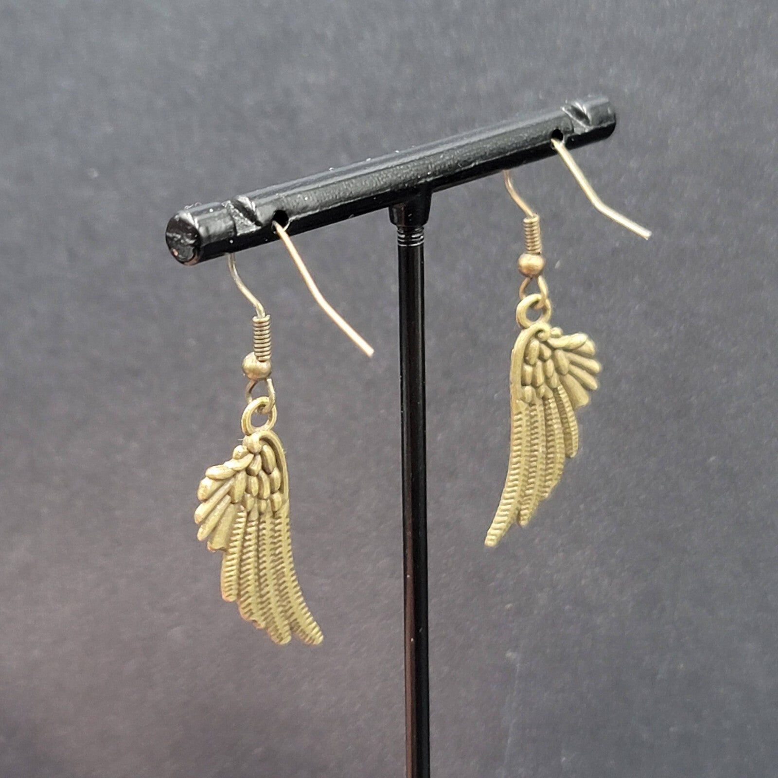 Feather Wings Pierced Earrings Bronze tone Metal Embossed Dangle 1 1/8"