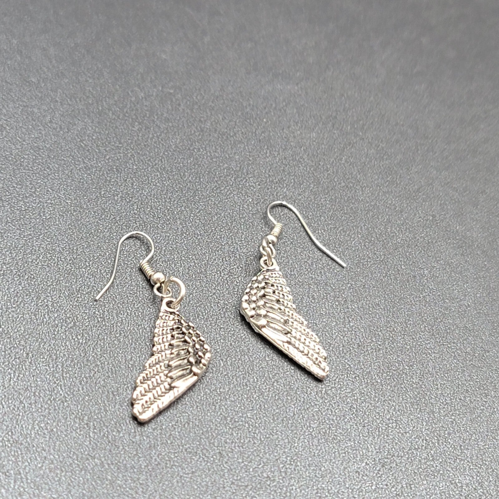 Pierced Earrings Silver tone Detailed Wings Dangle 1 1/8"