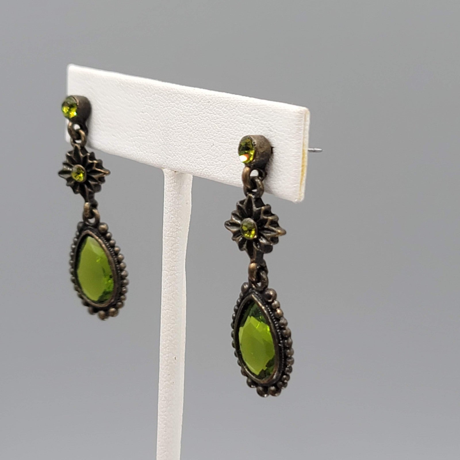 Green Rhinestone Teardrop Dangle Pierced Earrings Bronze tone 1.5 in