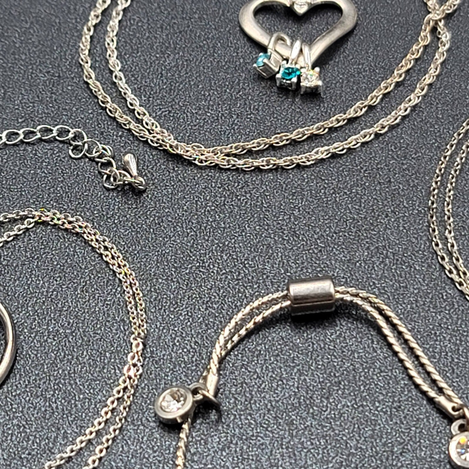 Lot of 4 Costume Crystal Silver tone Jewlery 3 Pendant Necklaces 1 Love Bracelet