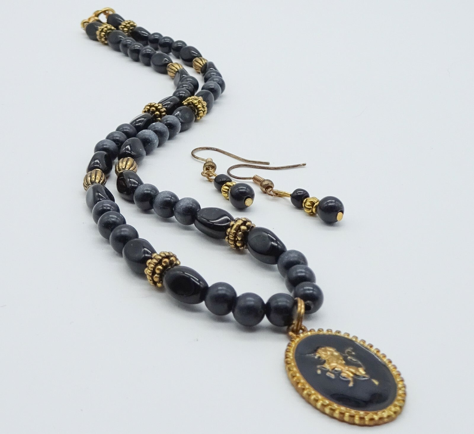 Unicorn Pendant Black Glass and Plastic Beaded Necklace Pierced Earring Set