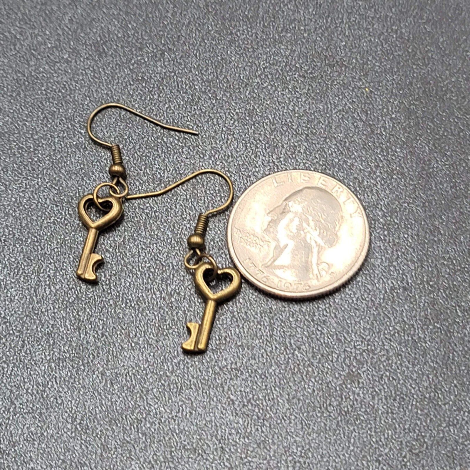 New Pierced Earrings Bronze tone Heart Skeleton Key Dangle 5/8"