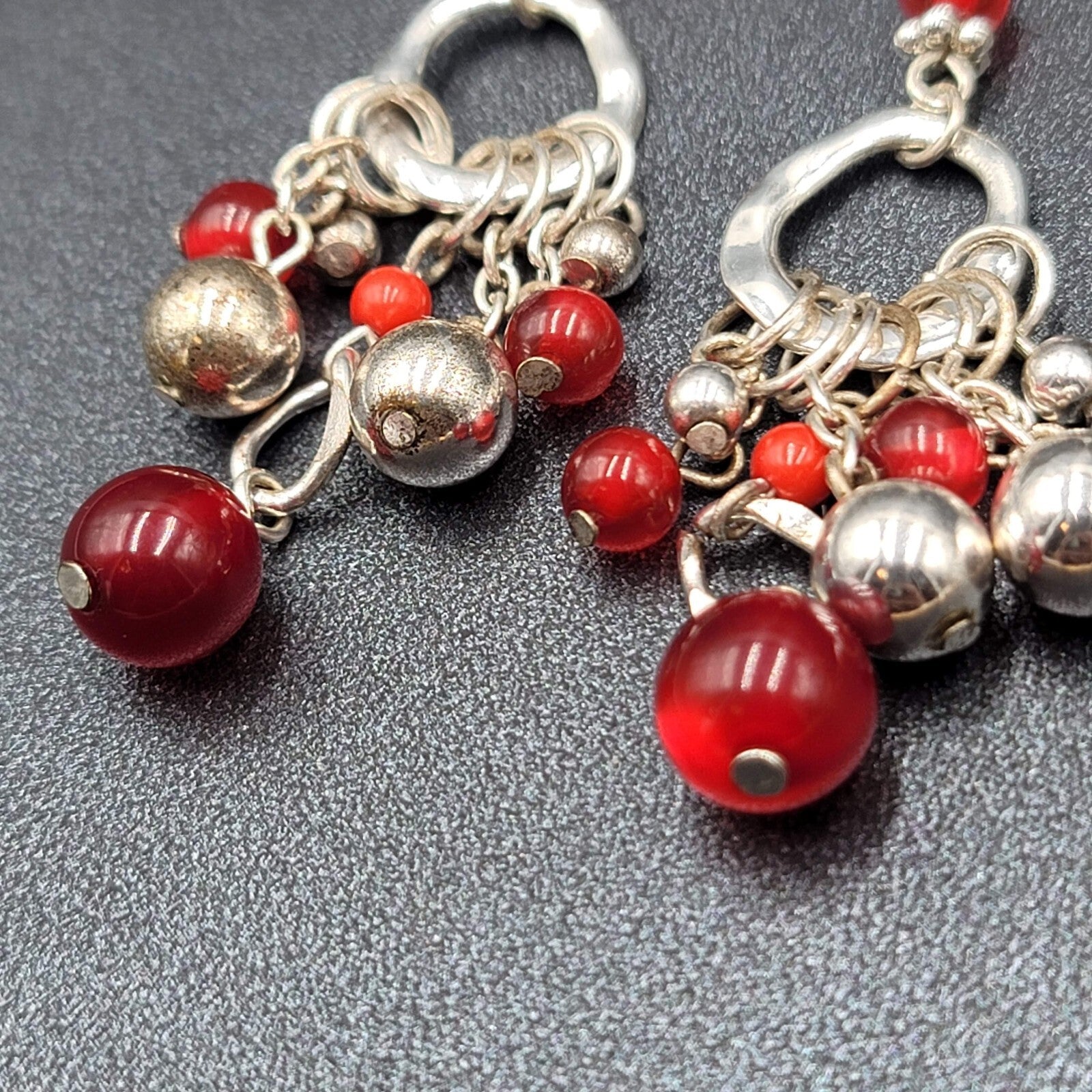 Pierced Earrings Silver tone Moonglow Red Beads Dangle 2.5"