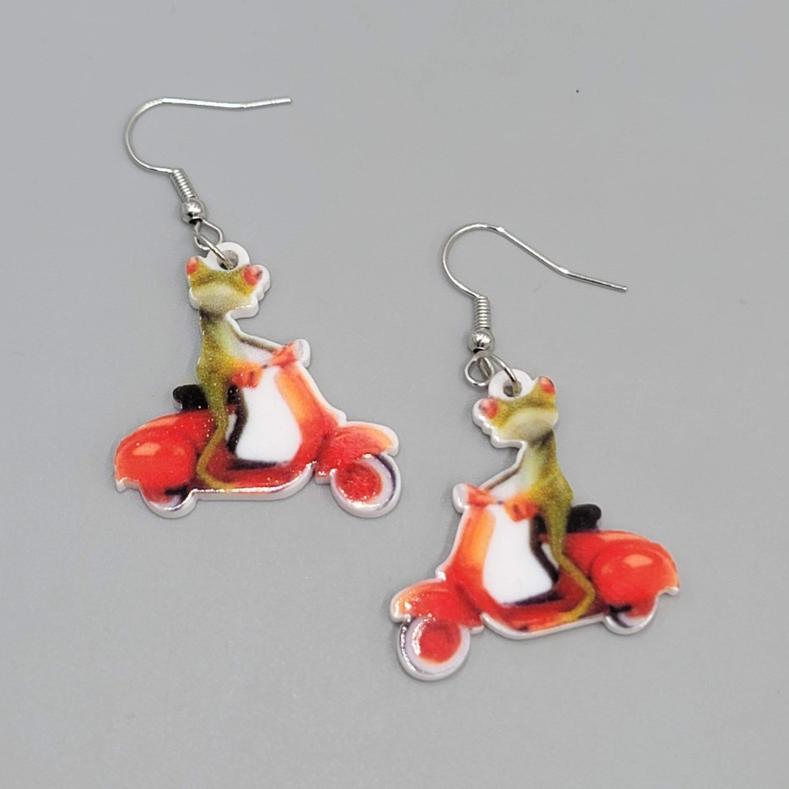 Lizard on a Scooter Pierced Earrings Silver tone Dangle  1.25 in