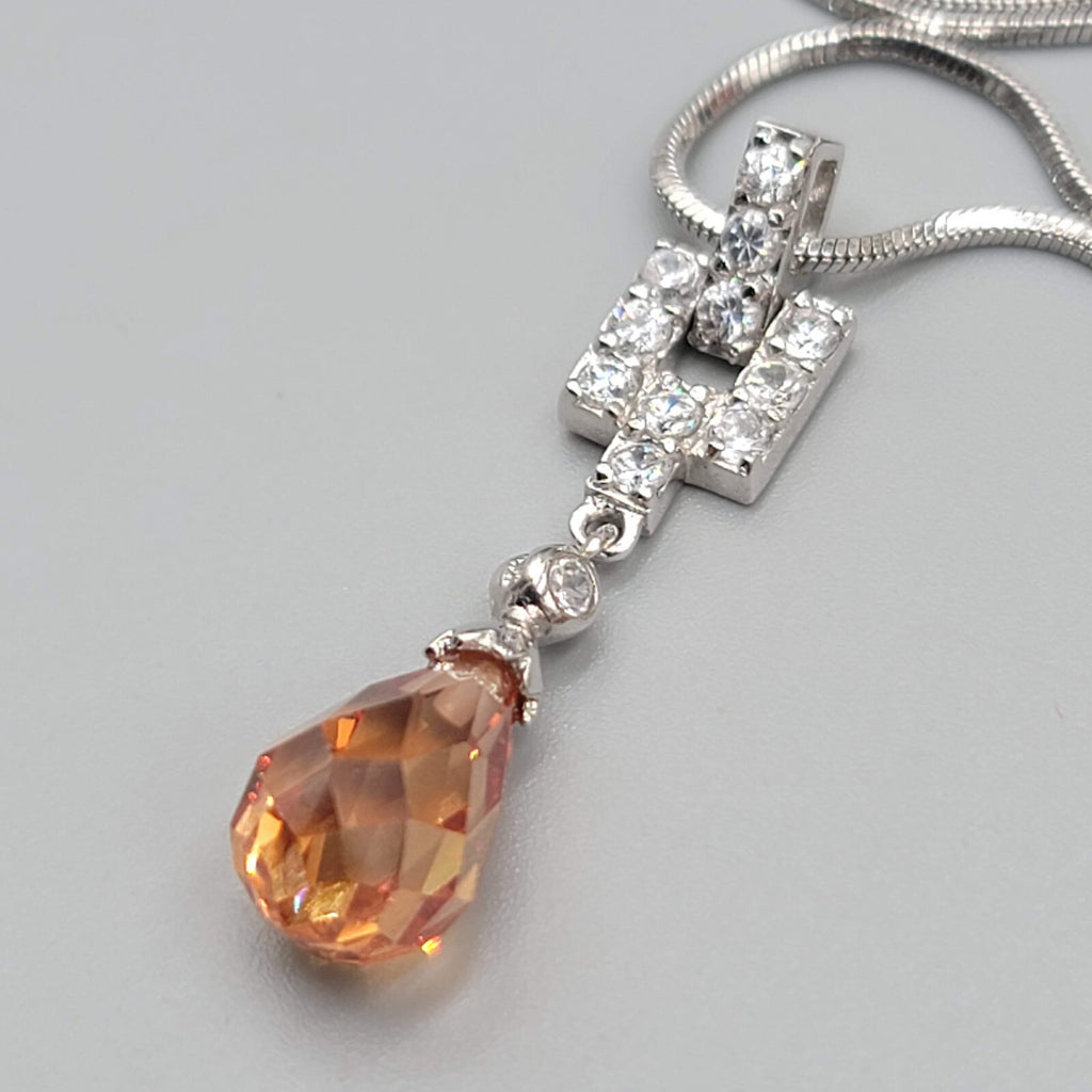 Orange Crystal Teardrop Pendant Necklace Silver tone Snake Chain 15"